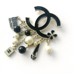 Large black enamelled and silvered metal Double C 'charm' brooch, Chanel, 2014