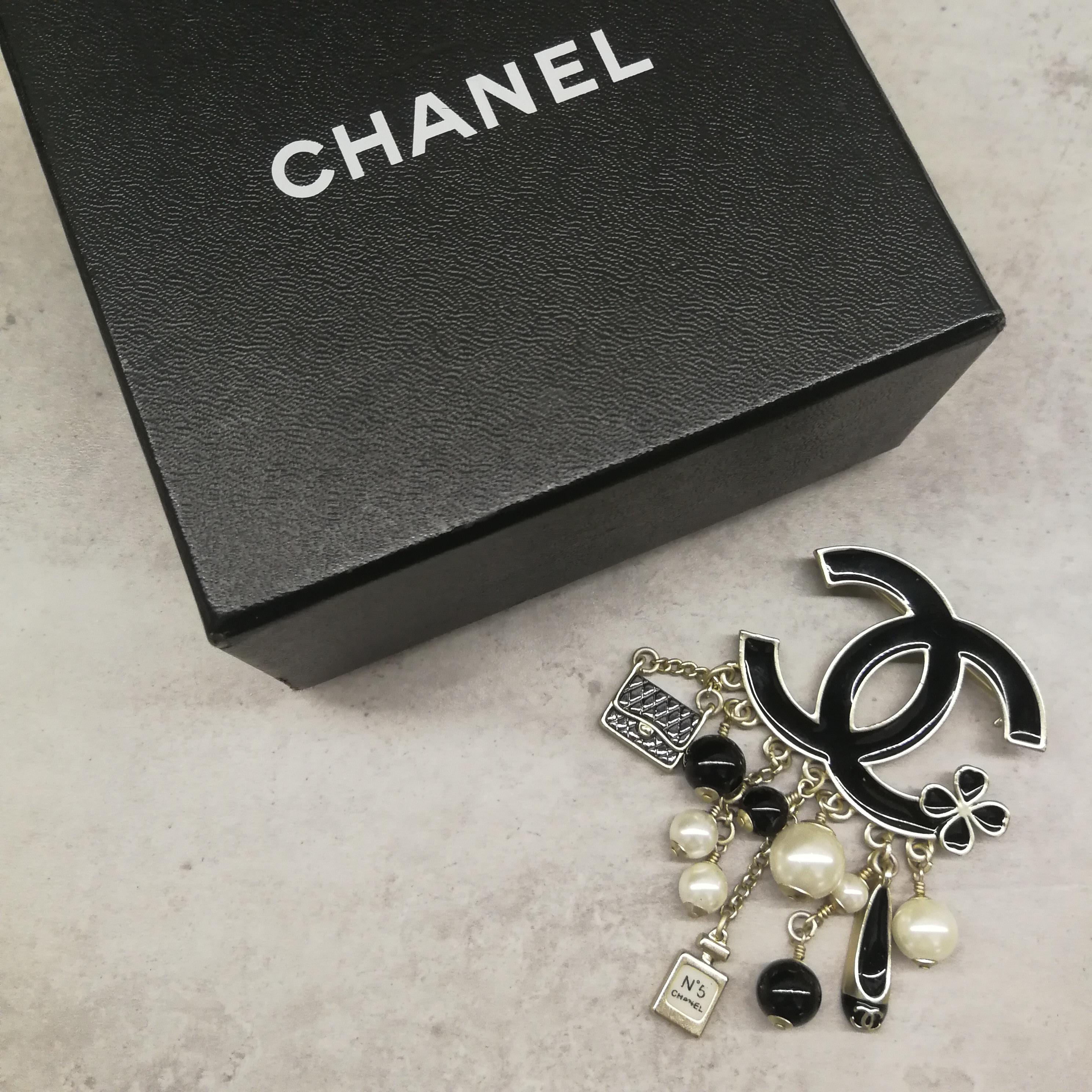 Large black enamelled and silvered metal Double C 'charm' brooch, Chanel, 2014 1