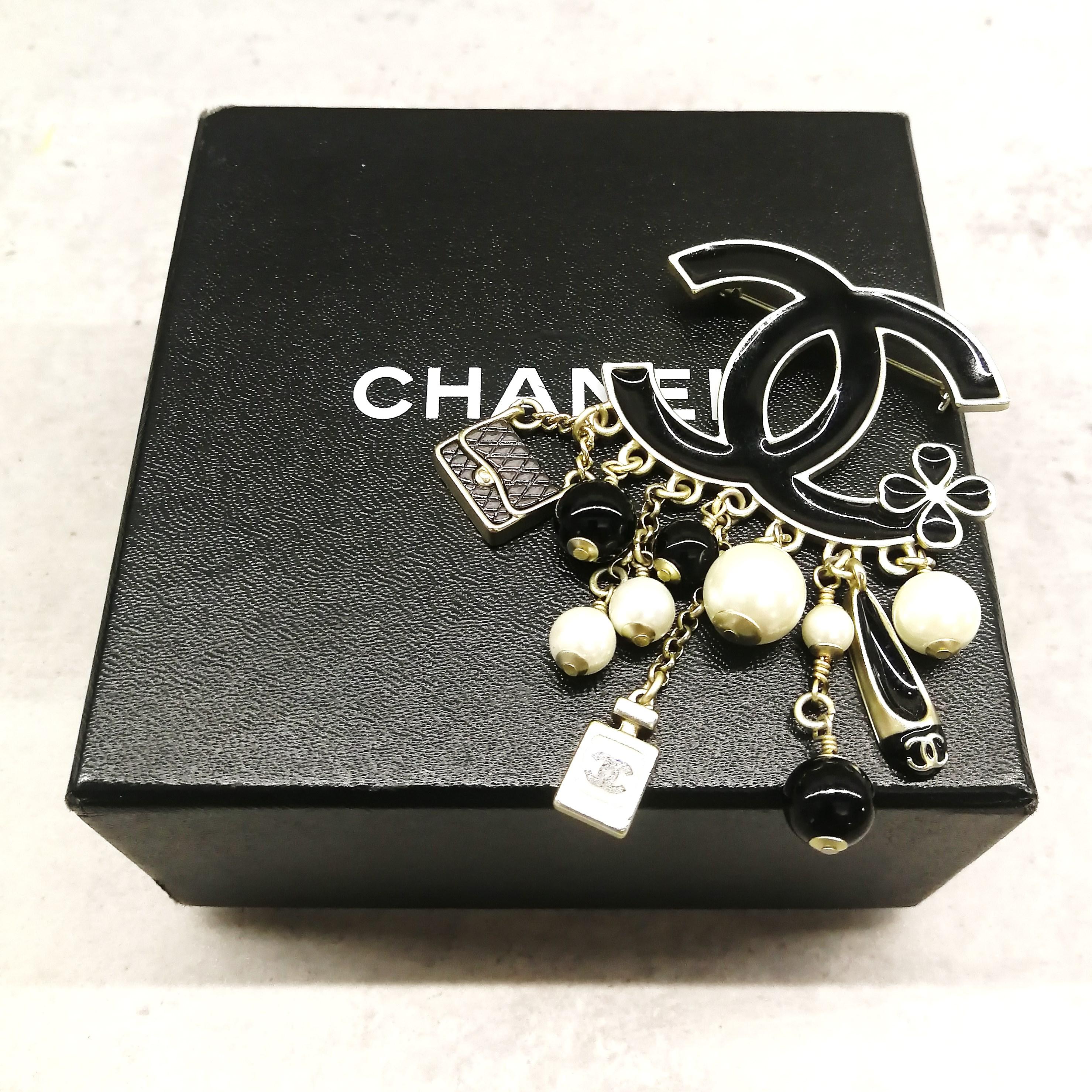 Large black enamelled and silvered metal Double C 'charm' brooch, Chanel, 2014 2