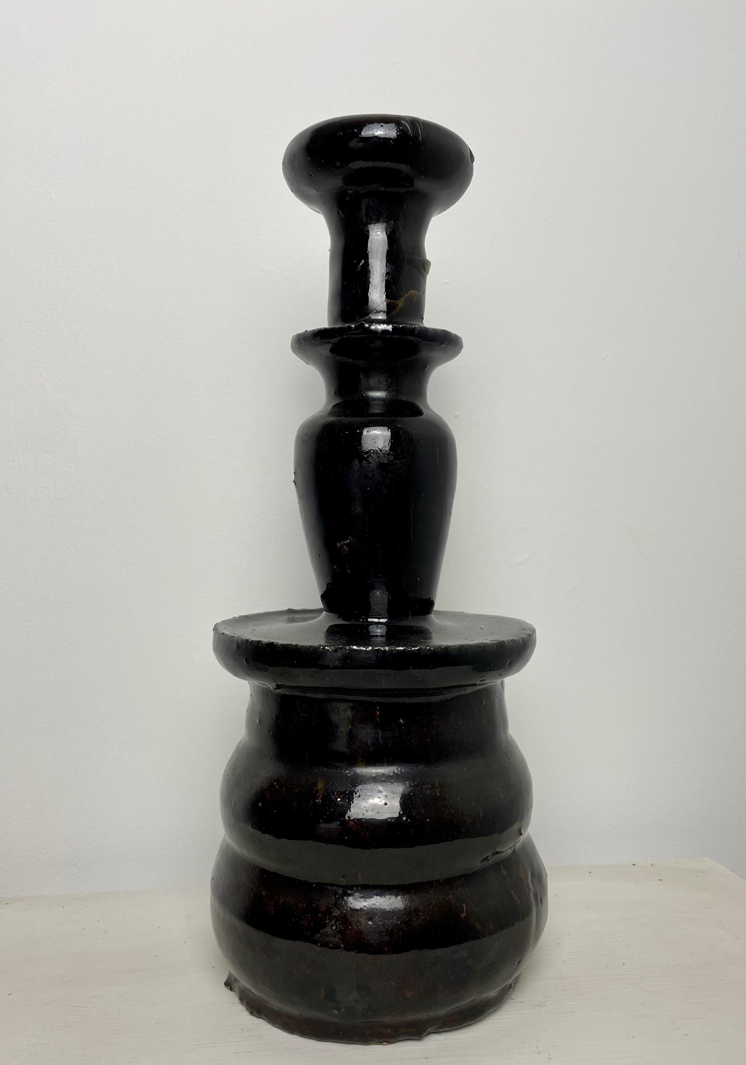 Beautiful and large black glazed Chinese ceramic altar candlestick with brown highlights.
Beautiful decorative object.
Period: 19th century.