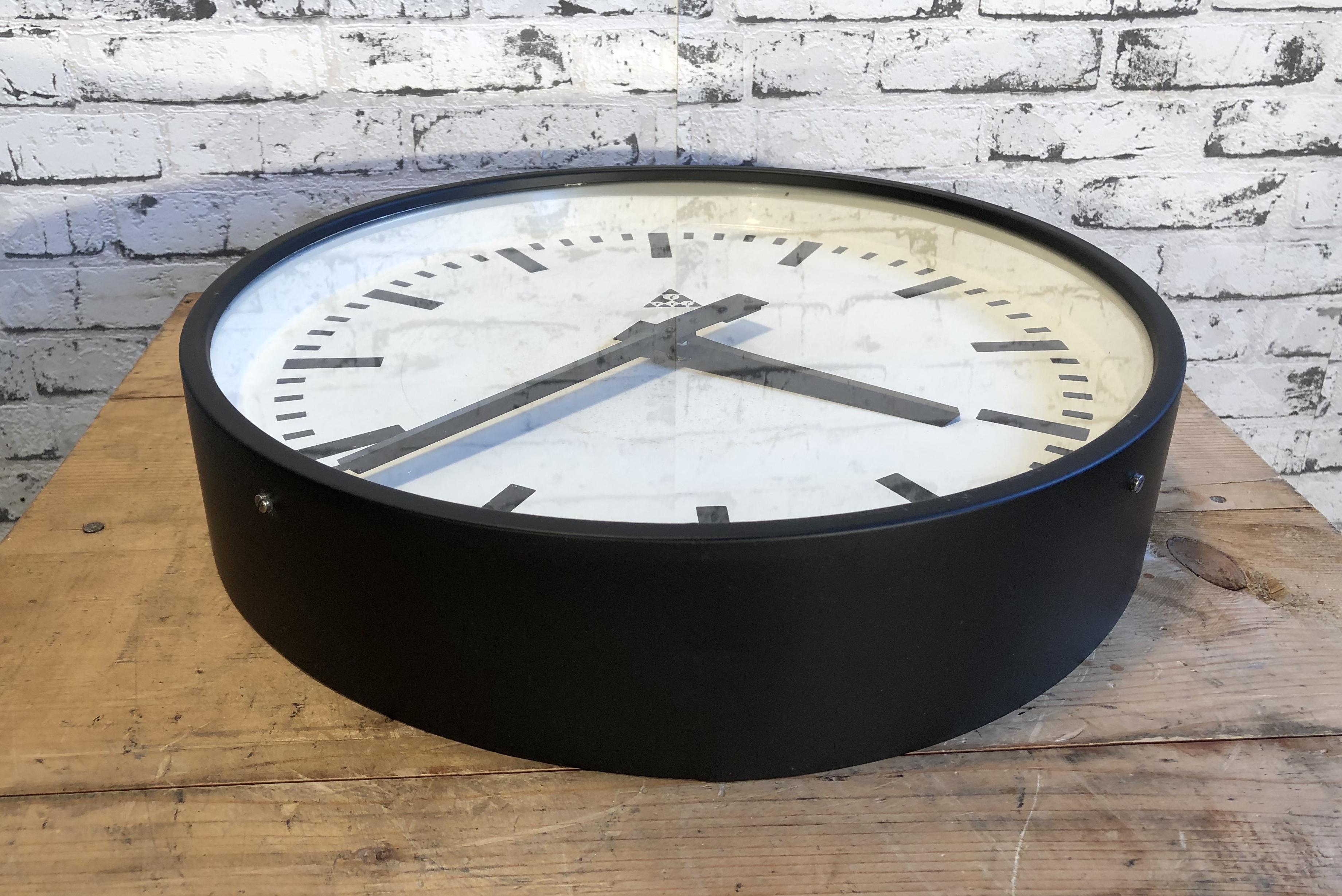 Iron Large Black Industrial Clock From Pragotron, 1960s