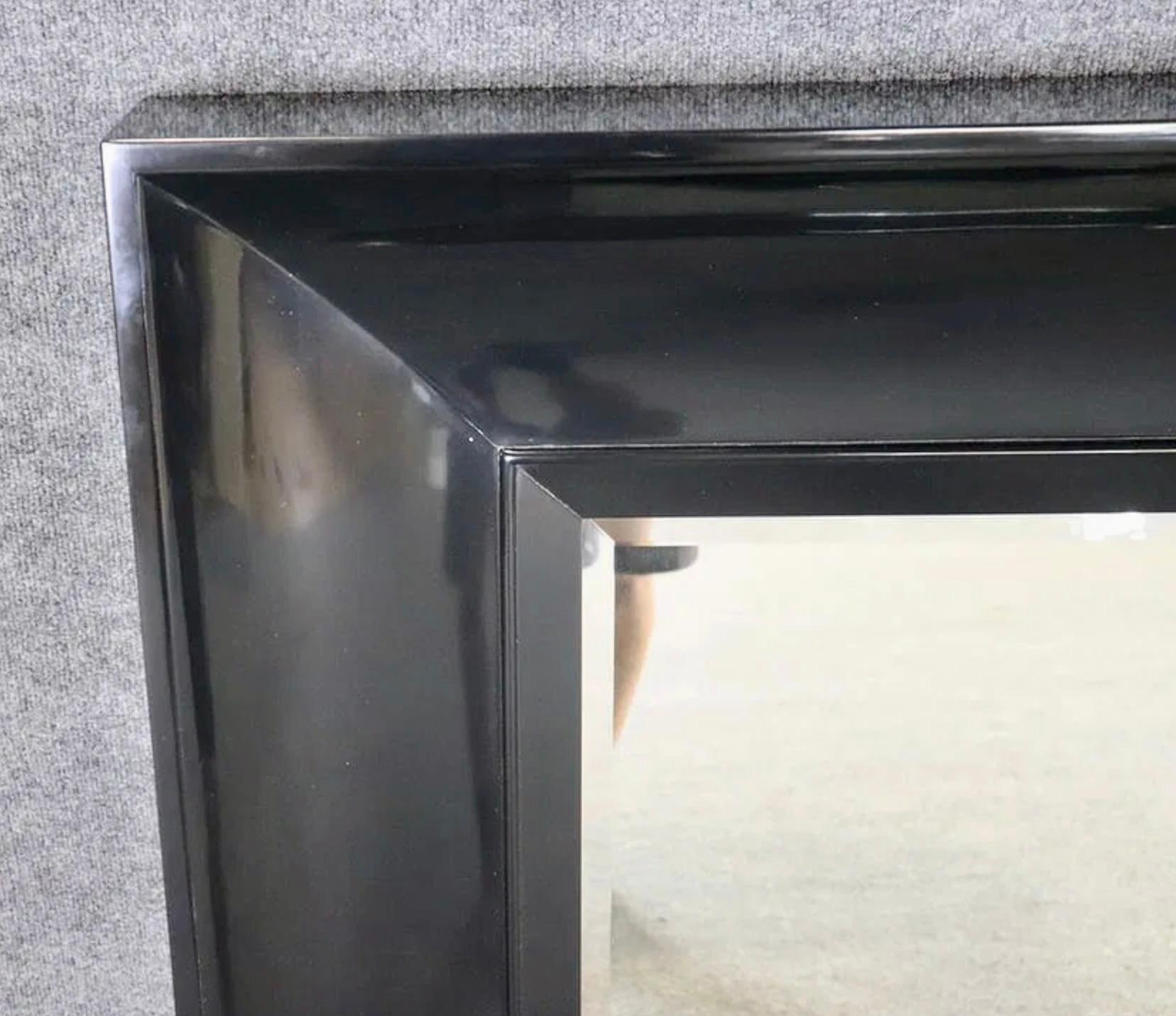 This black framed mirror is simple and elegant with a beveled mirror inside the thick concave frame.
Please confirm location with vendor NY or NJ