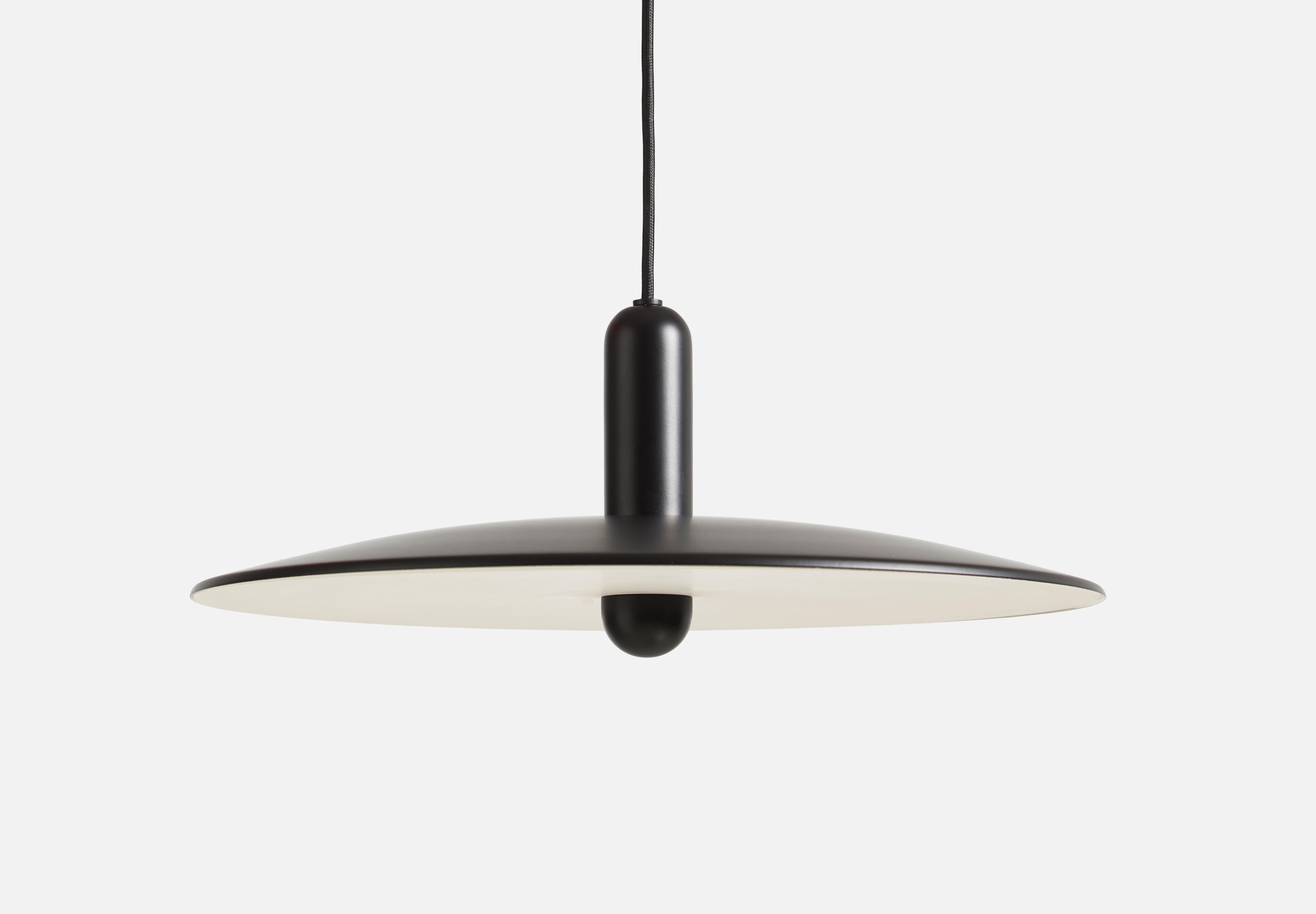 Large black Lu pendant lamp by Beaverhausen
Materials: metal.
Dimensions: D 45 x H 22 cm
Available in black or taupe and in 2 sizes: D33, D45 cm.

Beaverhausen is a Brussels-based design studio founded by Mimy A. Diar and Ad Luijten. Both have