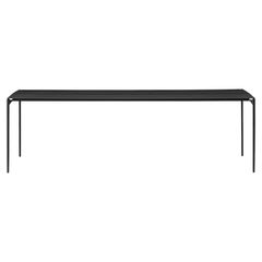 Grande table noire minimaliste