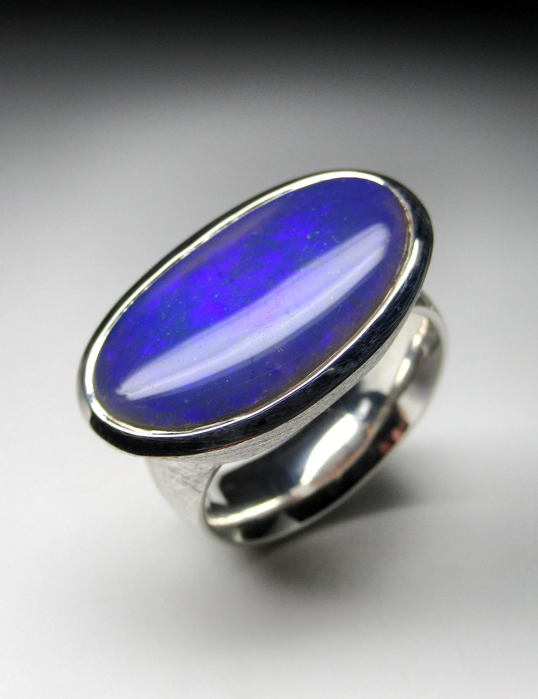Large matte finish silver ring with natural Black Opal 
gemstone origin - Australia
opal measurements - 0.12 x 0.51 x 0.91 in / 3 x 13 x 23 mm
opal weight - 8.55 carats
ring size - 8.5 US
ring weight - 12.31 grams


We ship our jewelry worldwide –