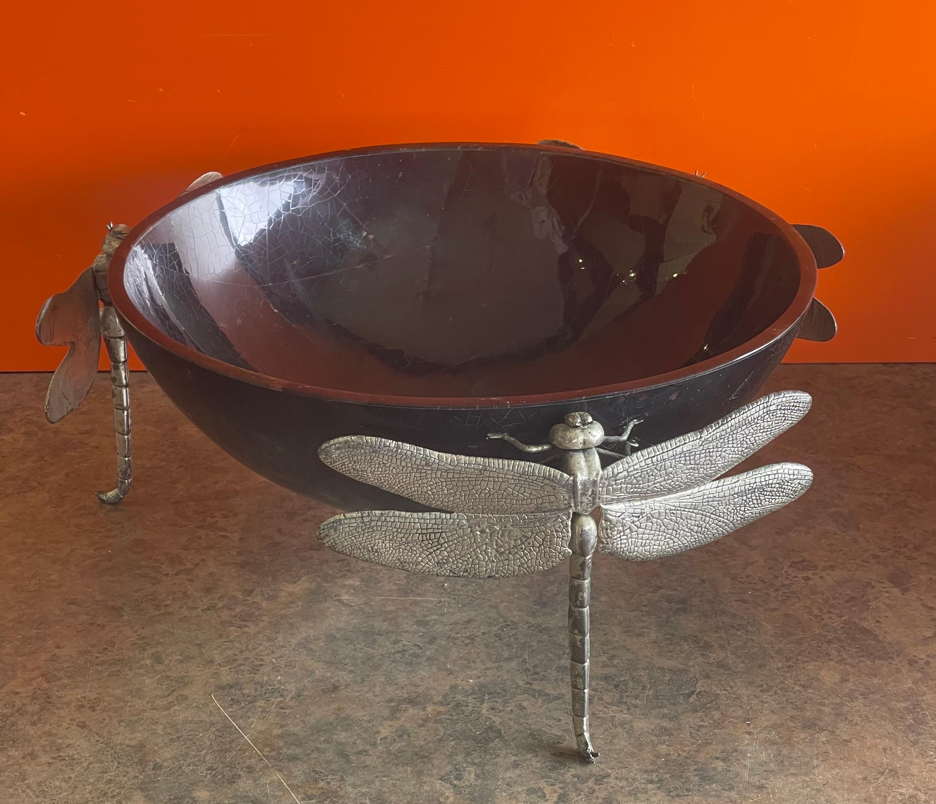 Gorgeous vintage black penshell centerpiece bowl with detailed dragonfly feet, circa 1990s. The dragonfly signifies transformation and adaptability. This beautiful handmade bowl is formed by creating a mosaic of black penshell, embellished with