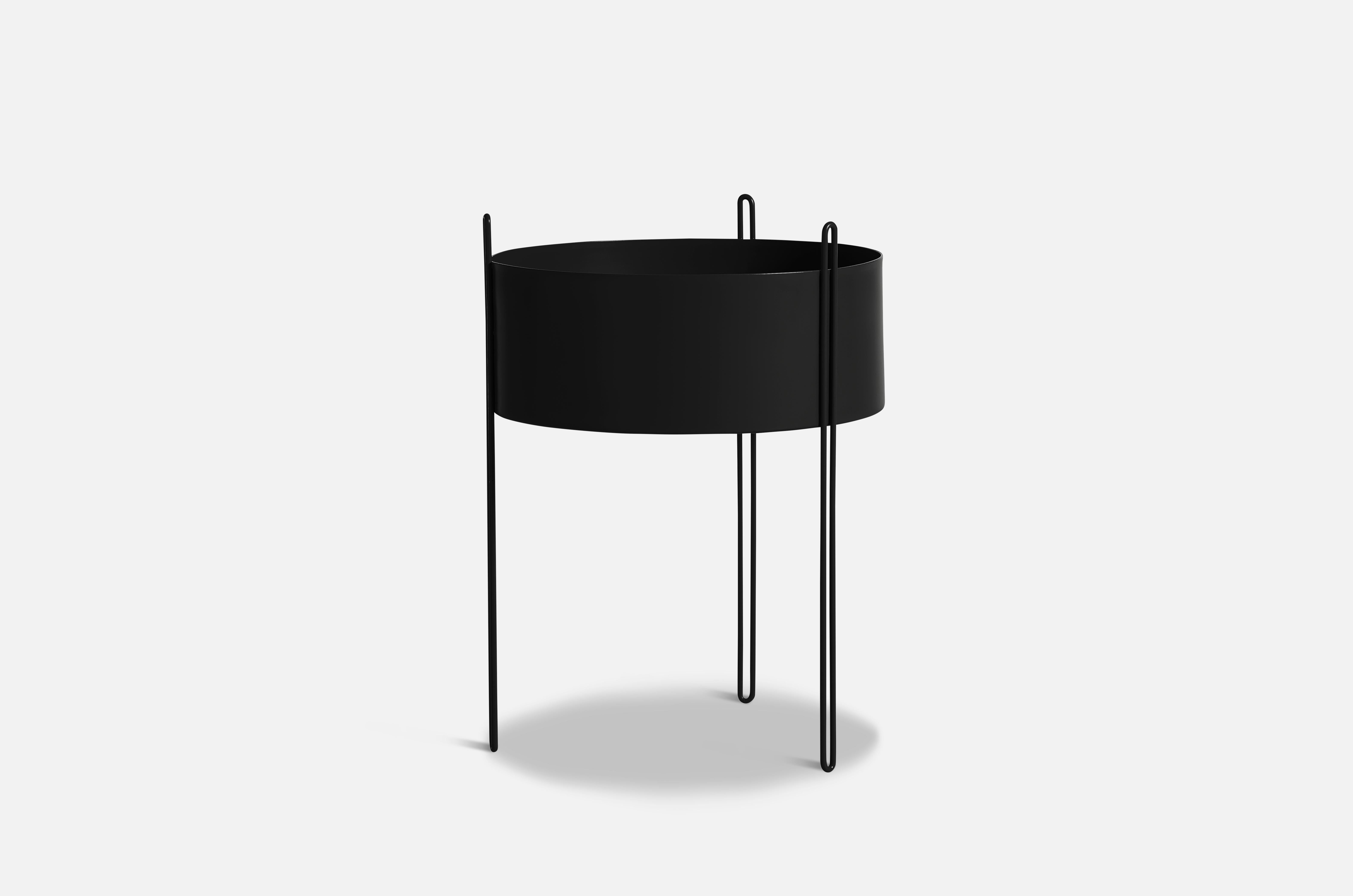 Large Black Pidestall planter by Emilie Stahl Carlsen
Materials: Metal.
Dimensions: D 40 x H 55 cm
Available in grey, red, taupe or black and in 3 sizes: D15 x H15, D40 x H35, D40 x H55 cm.

Emilie Stahl Carlsen is a Nor wegian designer who