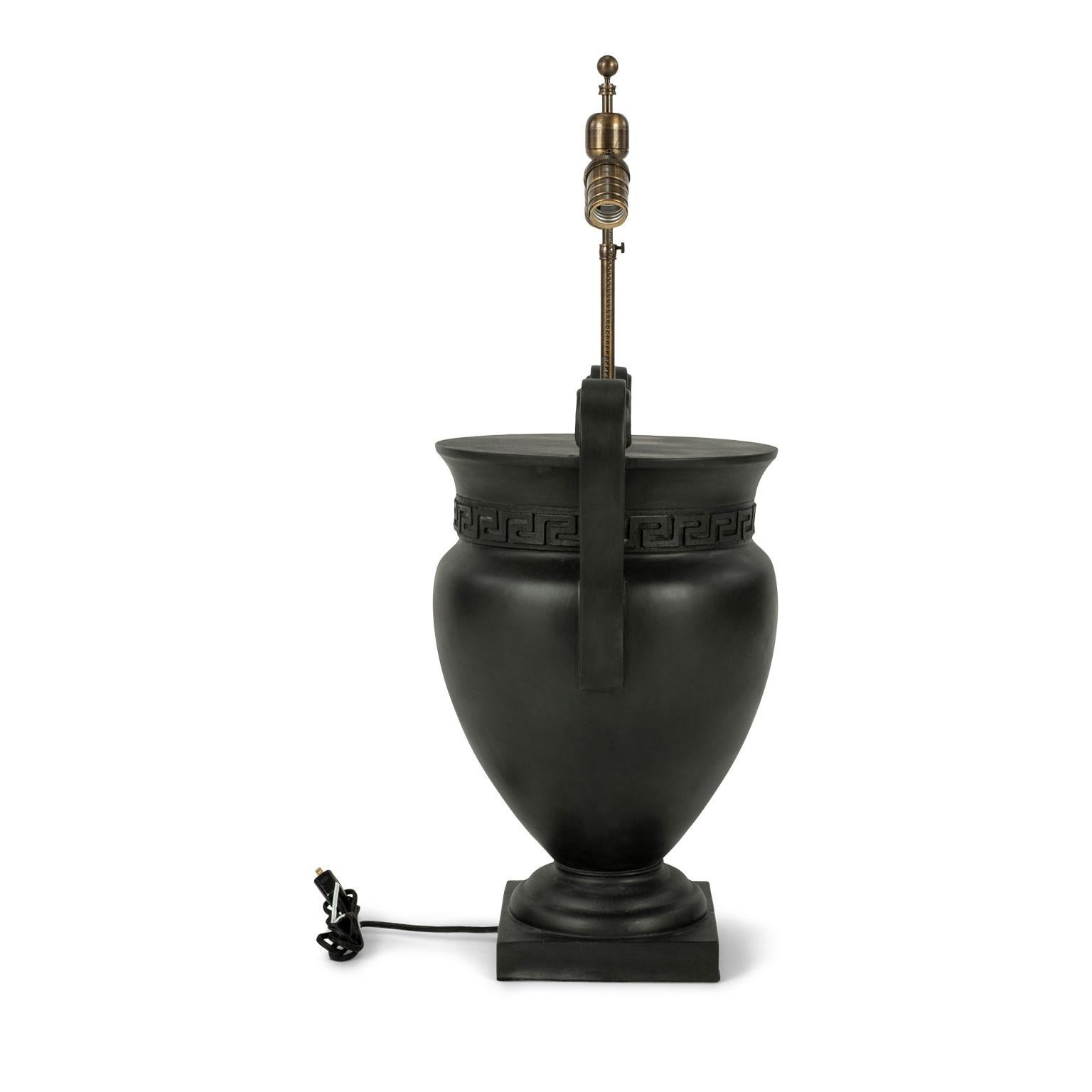 Large black plaster urn-shape lamp, decorated in Greek key motif, by Liz Marsh. Newly wired for use within the USA using UL listed parts. Features two down-turned medium size sockets. Listed height measured to top of central stem (sold without