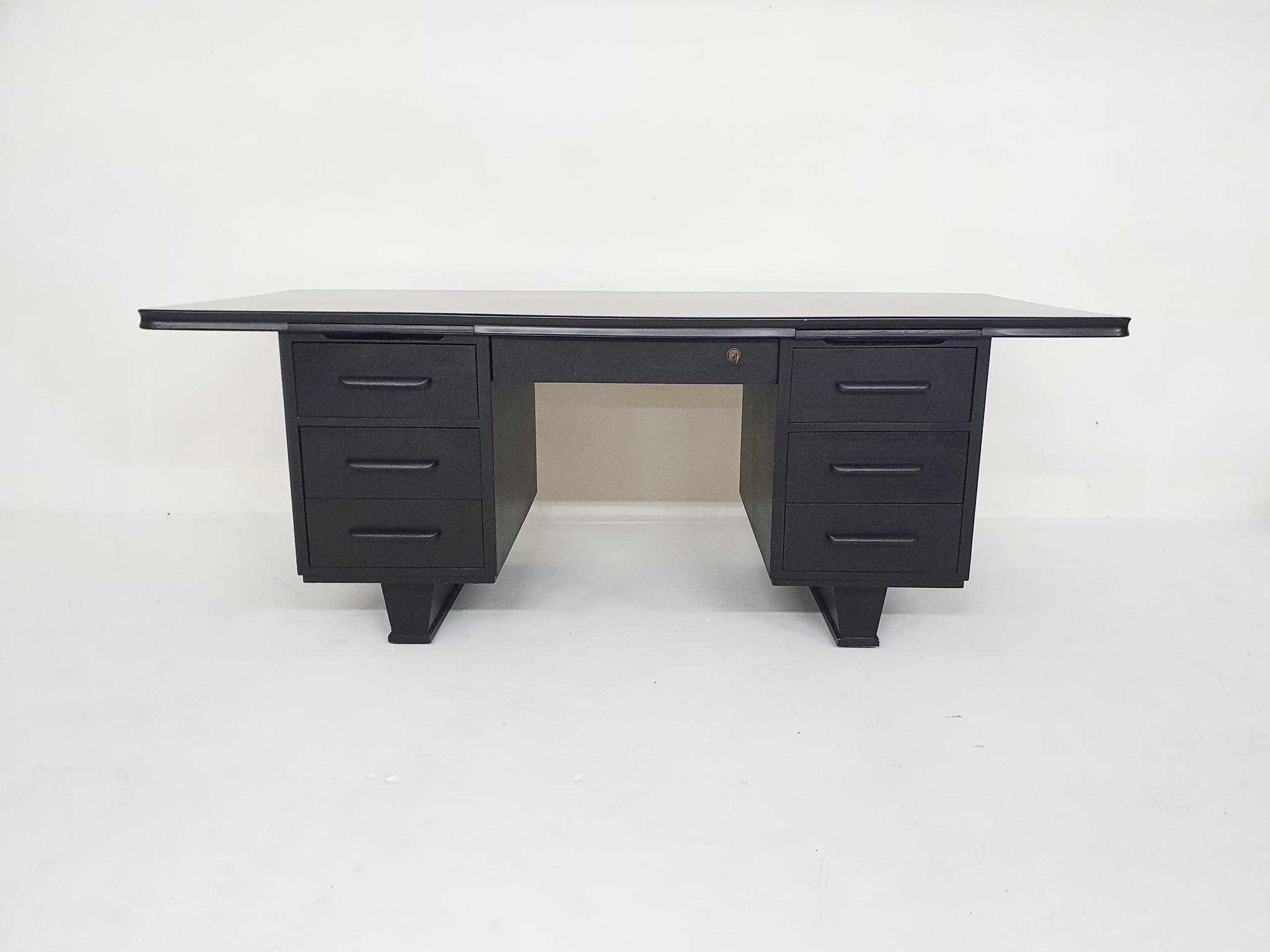 Large executive desk in black painted wood. In very good condition.