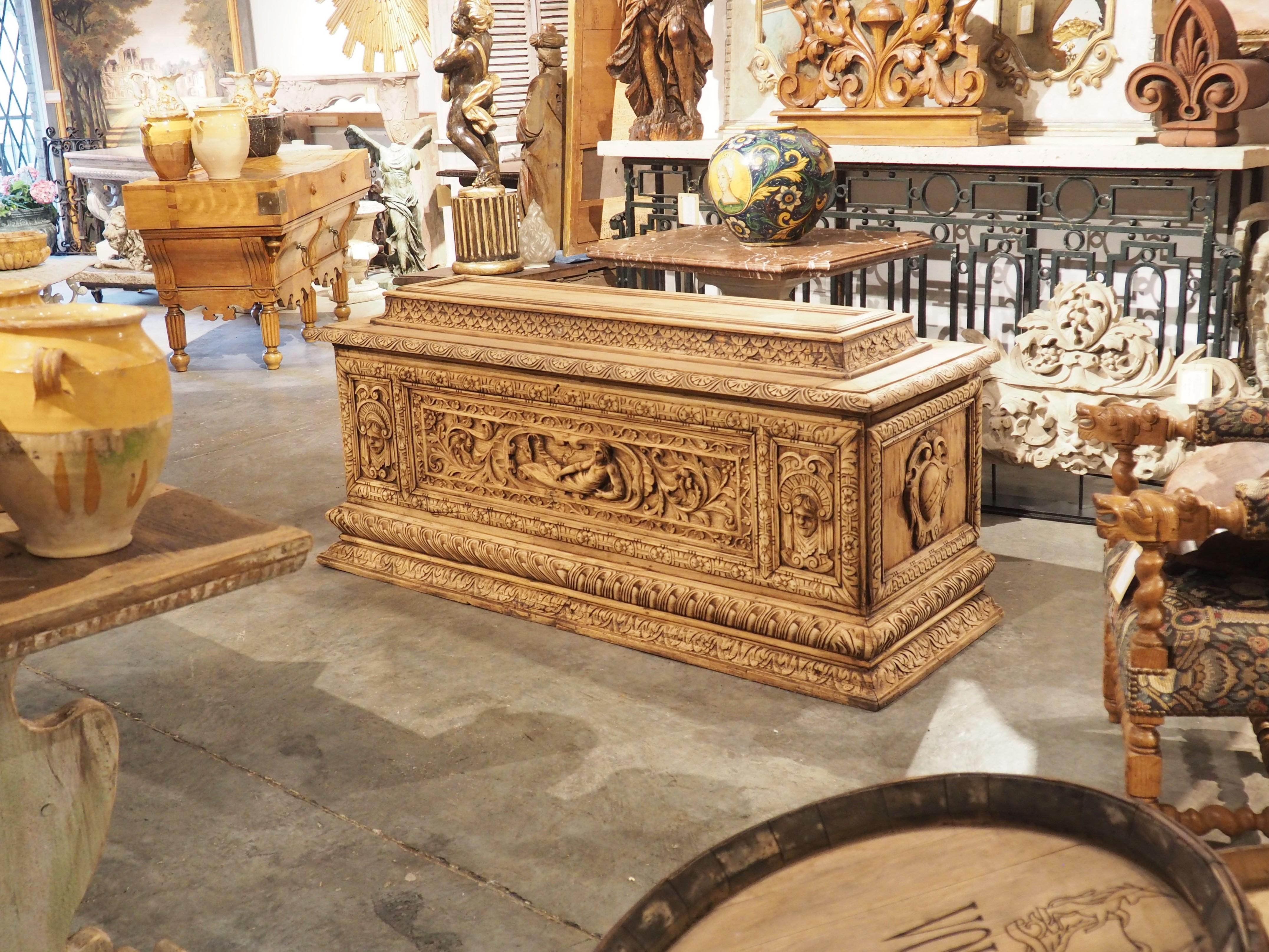 From Italy, circa 1900, this large and impressive Italian cassone has been hand carved in the Renaissance style. A cassone is a lavishly worked trunk that was often given as a wedding dowry. It was an important piece of furniture, providing storage