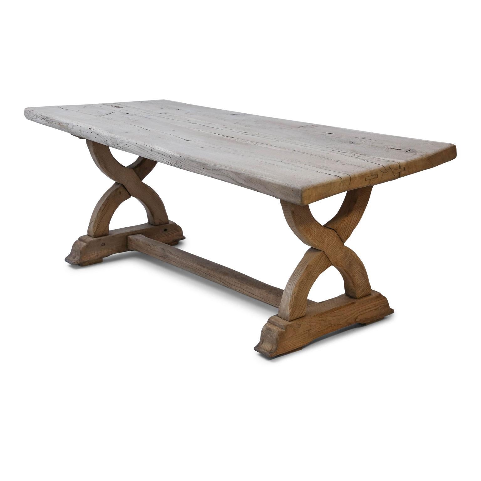 Large bleached oak table: Thick rectangular top supported by trestle base. French in origin (probably Alsace region) and dates to the late 19th century.