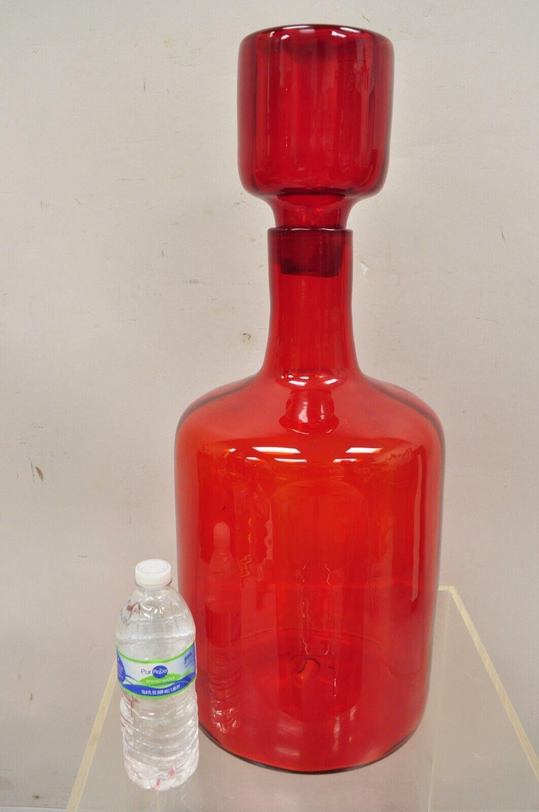 Large Blenko red blown Art Glass vase vessel jug with stopper. Circa 1960s.
Measurements: 23.5