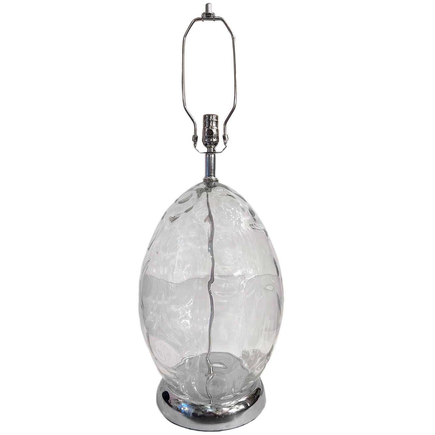 A circa 1960's Italian blown glass lamp with nickel plated base.

Measurements:
Height of body: 19