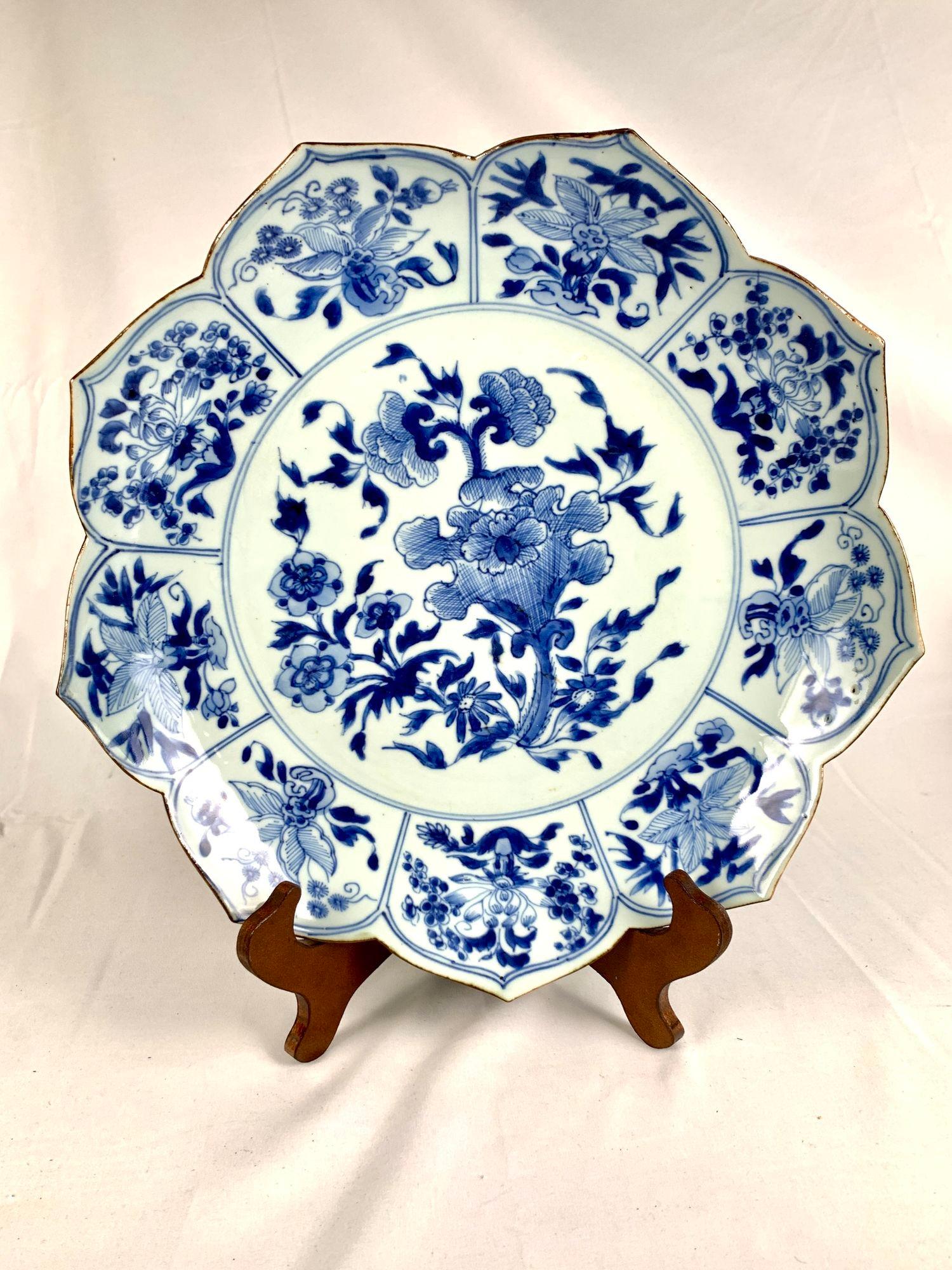 This classic 18th-century Chinese porcelain lotus form dish was shaped to resemble an open lotus flower.
The dish has hand-painted floral decoration in several shades of blue on a traditional light blue ground.
 In the center is a large blossoming