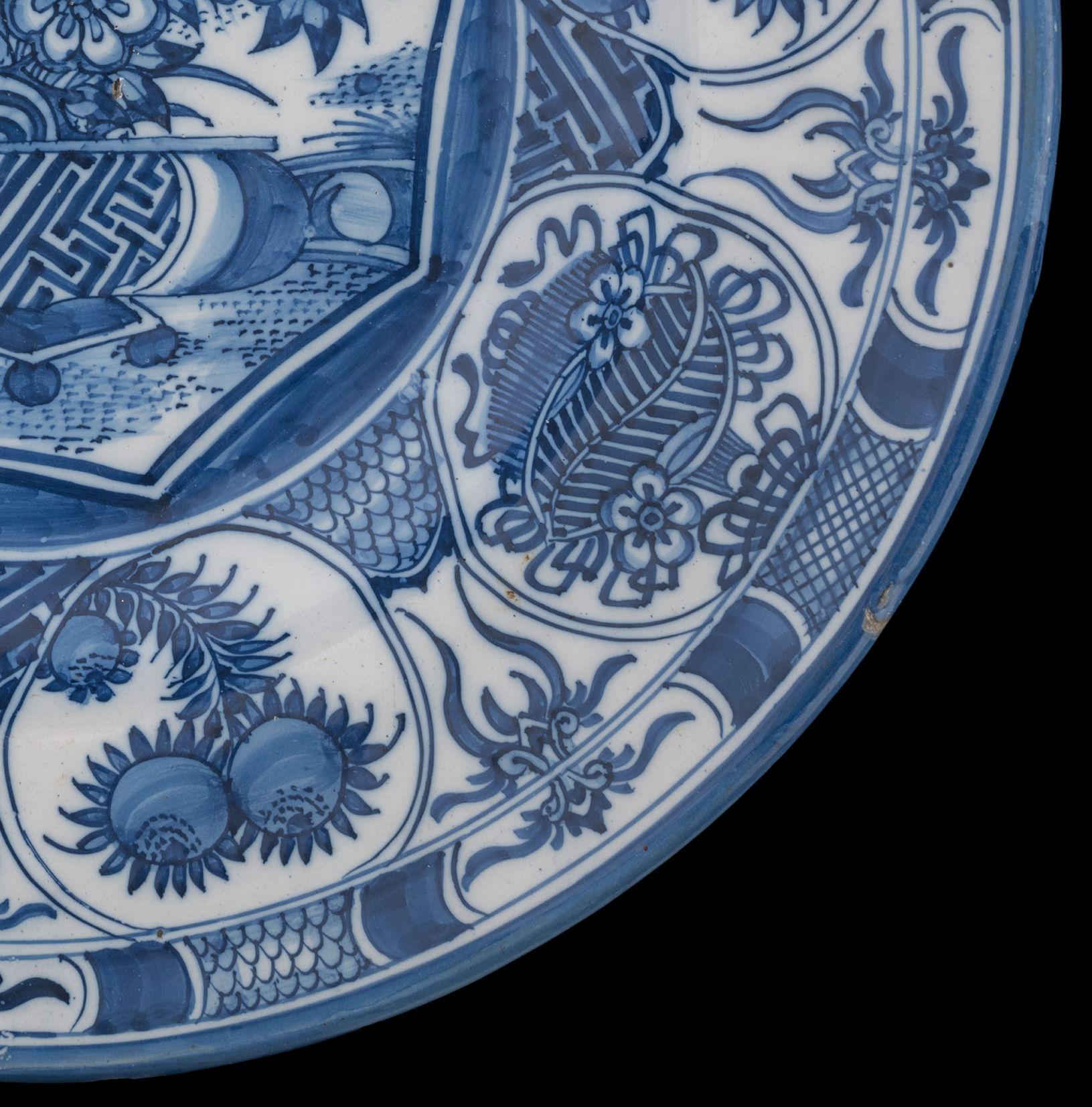 Glazed Large Blue and White Dish with a Flower Basket Delft, 1650-1680 For Sale