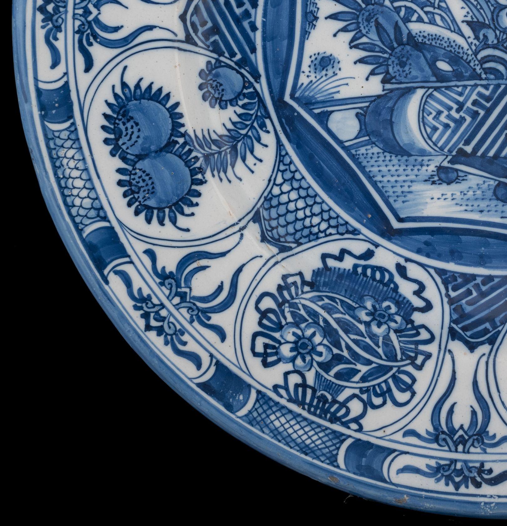 Large Blue and White Dish with a Flower Basket Delft, 1650-1680 In Fair Condition For Sale In ROSSUM, GE
