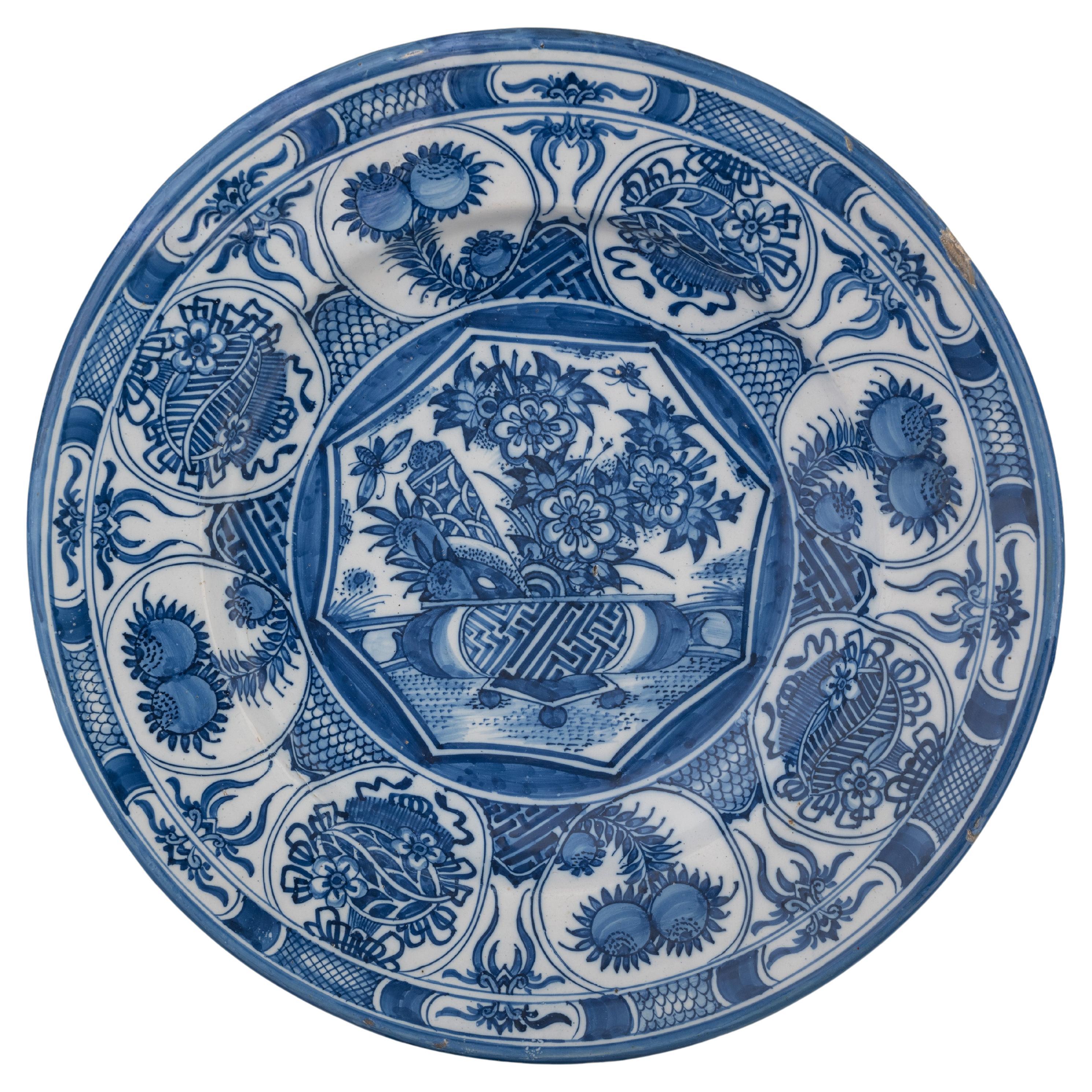 Large Blue and White Dish with a Flower Basket Delft, 1650-1680 For Sale