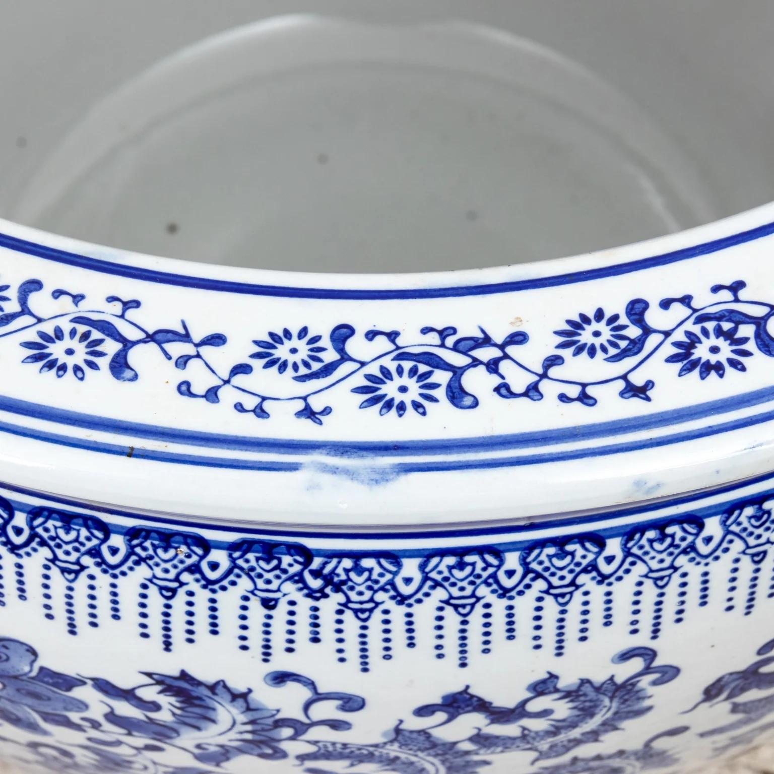 large blue and white ceramic planter