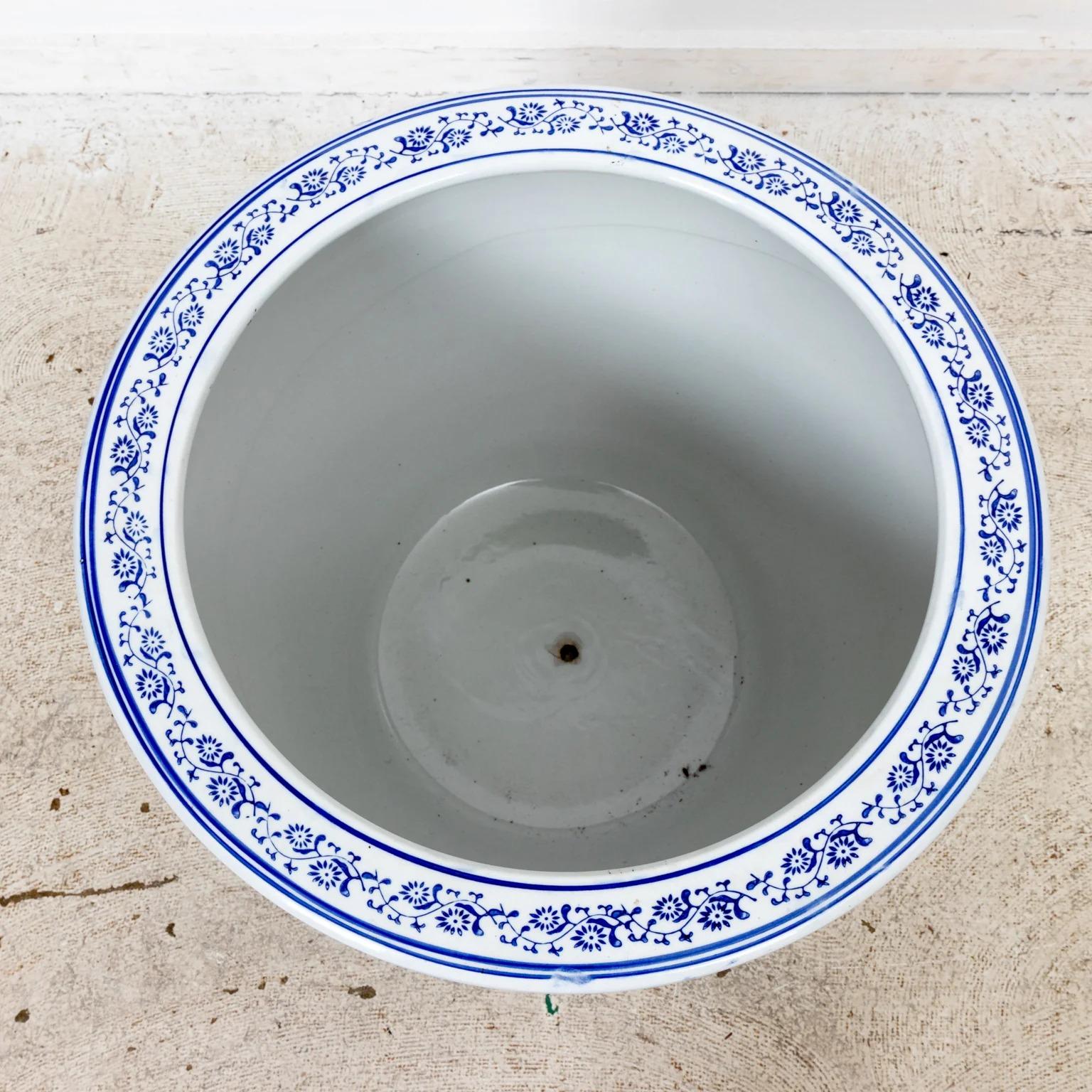 large blue and white planters