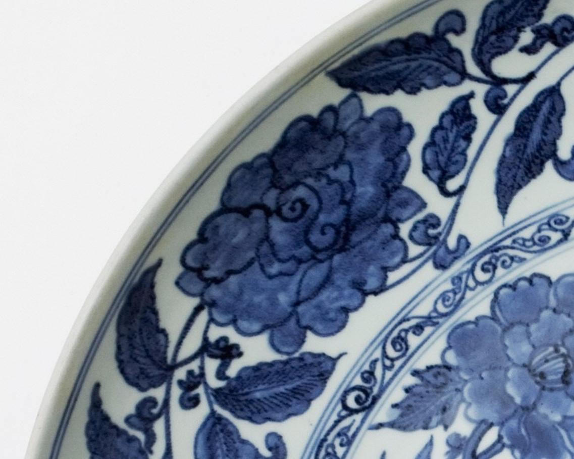Glazed Large Blue and White with 'Rockwork and Flowers' Dish, Qing dynasty For Sale