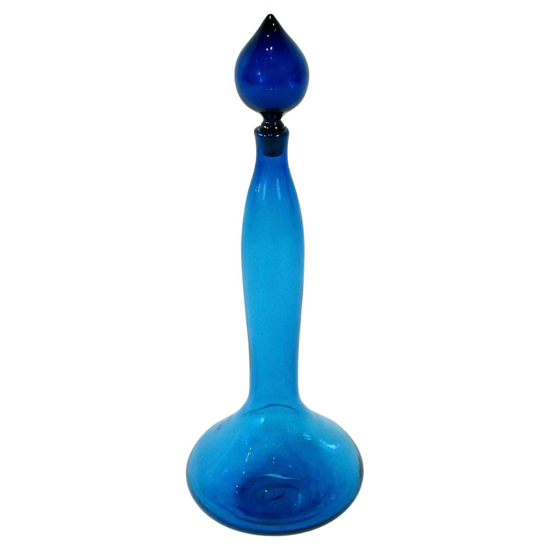 Large blue Blenko glass bottle with stopper For Sale