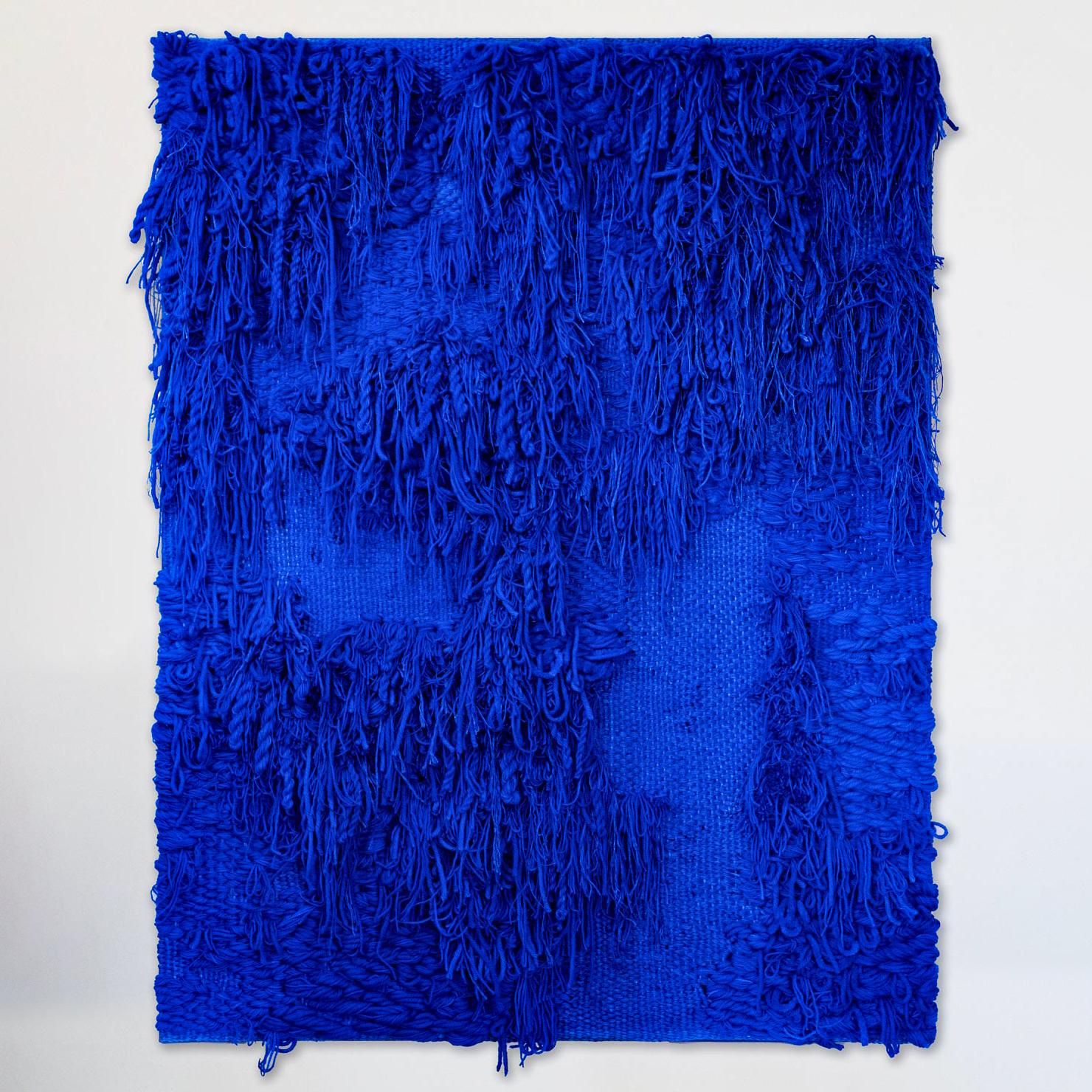 Title: BLUE II, Katja Beckman (b. 1990, Sweden)

This handwoven tapestry is complex, tactile and rich in color. The composition is made using various techniques and materials such as dyed linen, wool and artificial hair. 

Born in Skara, Sweden,