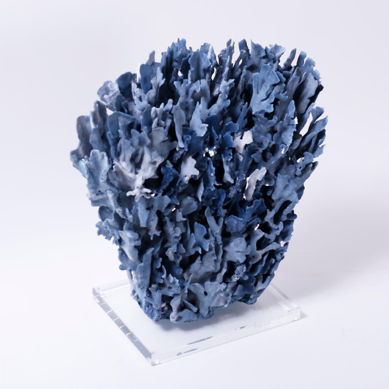 Impressive large blue coral sculpture or assemblage designed and crafted by F. S. Henemader with an alluring blue color and striking sea inspired texture and form. Presented on a Lucite base.

Coral being exported outside of the USA, requires
