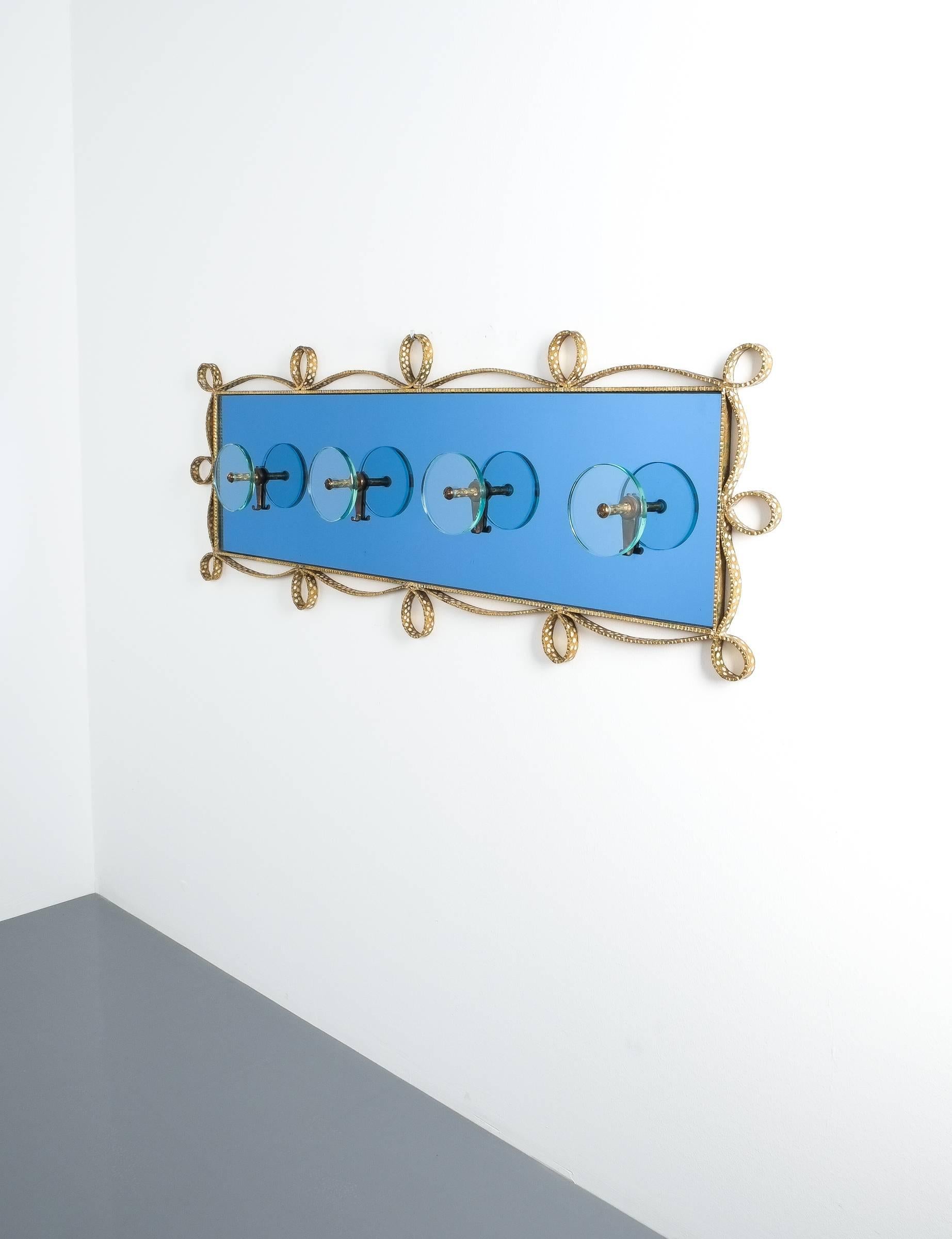 Pier Luigi Colli coatrack wall wardrobe iron blue glass mirror, Italy, 1955 (for crystal Art Torino) Beautiful coatrack made from smooth glass pieces in rare mirrored blue and clear glass. Typical Colli ornamental iron frame-work. Excellent