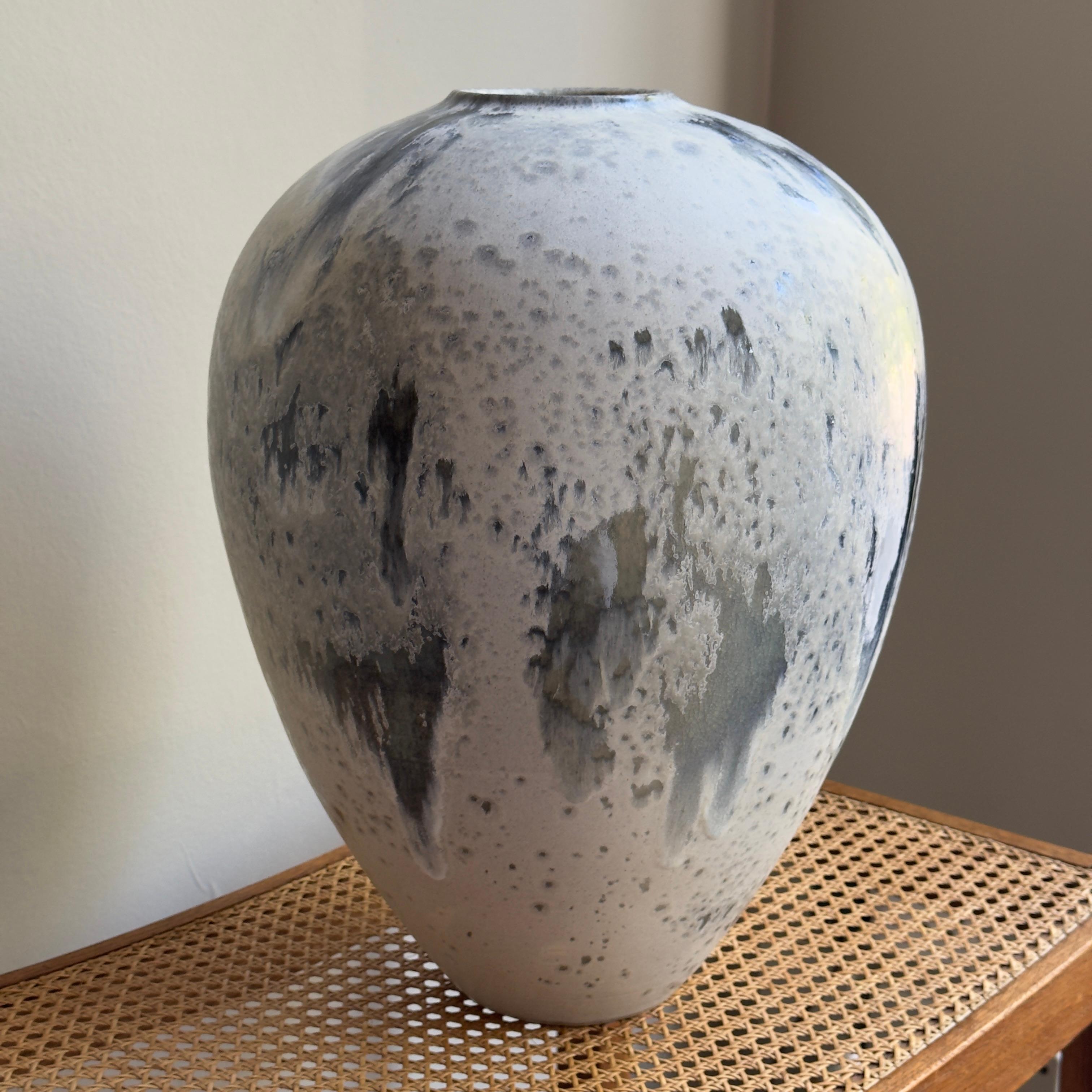A tall baluster vase made and designed in Denmark by the K H Würtz workshop. 

Characteristic of the Danish studio, the glaze of this elegant baluster vase is comprised of both matte and glassy areas. The monumental shape is glazed in a delicate