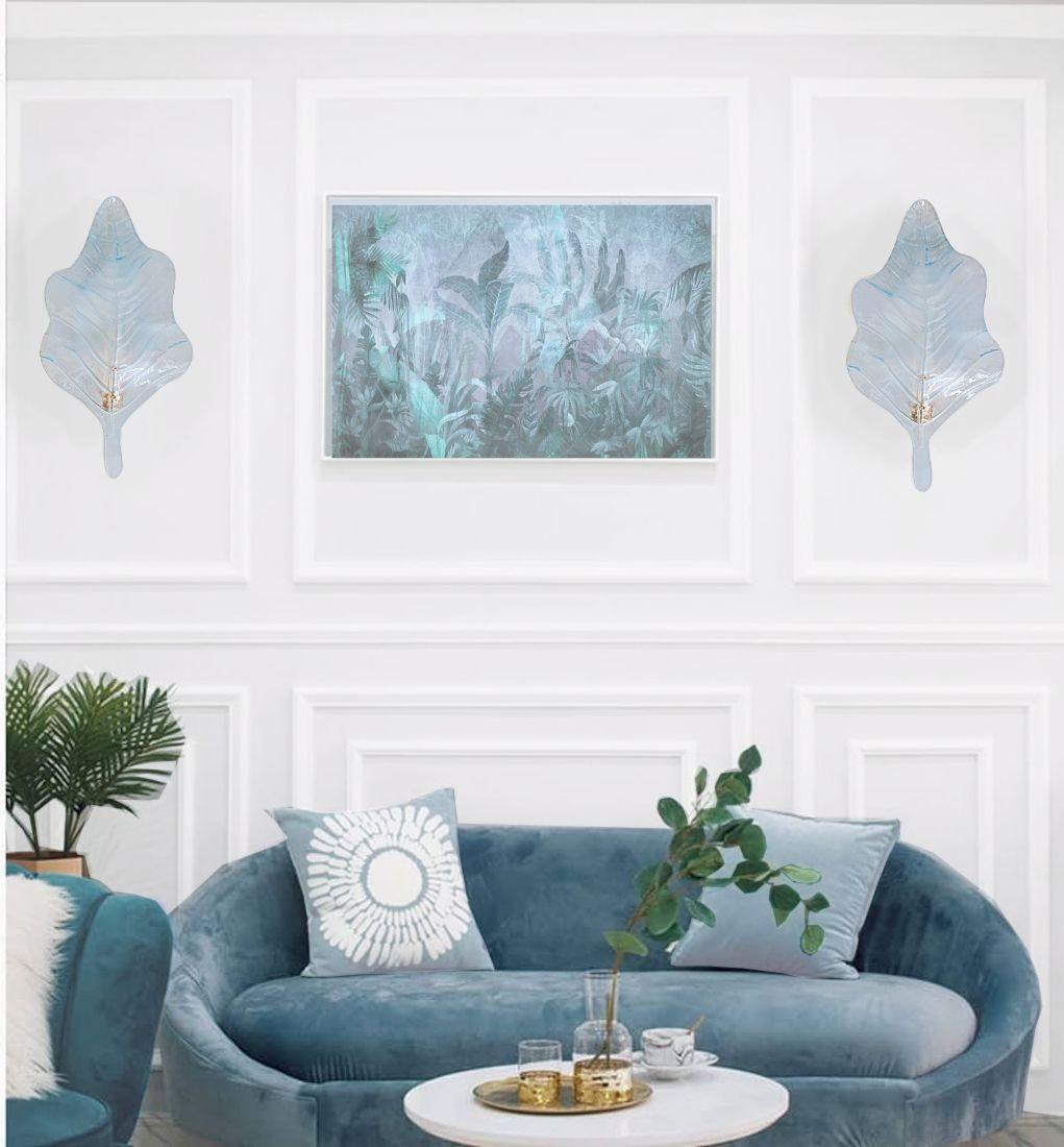 Pair of large Mid-Century Modern light blue Murano glass sconces, Mazzega style, Italy 1980s.
Three pairs of sconces available - Set of six sconces.
Sold and priced by pair. To inquire about the set of six, chose 3 items in the menu.
The large