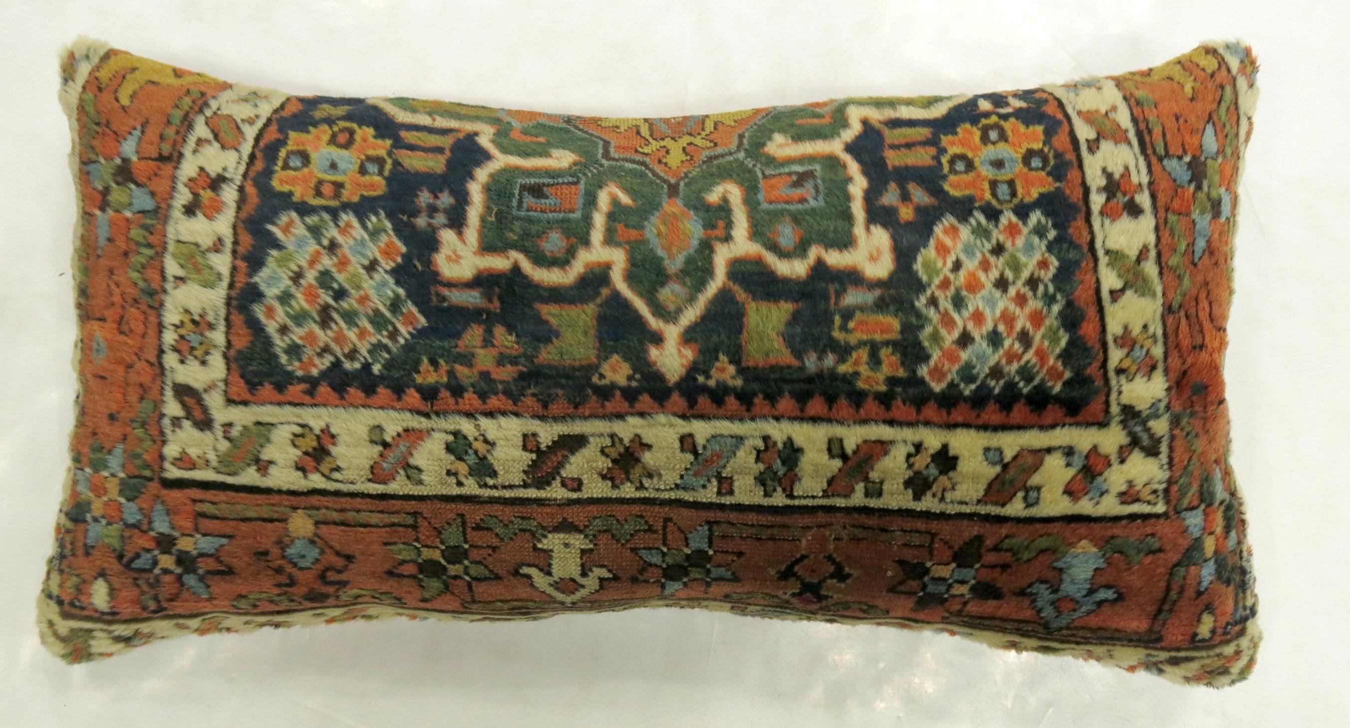 Pillow made from a vintage Persian Karadja Heriz rug.

Measures: 16
