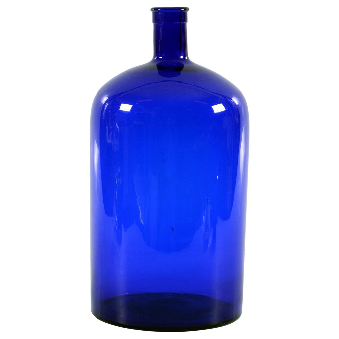 Pharmacy bottle from circa 1900s, blue glass, measures: height about 35 cm. Up to 4 available price/bottle
  