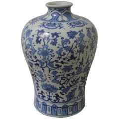 Large Blue, White Floral Chinese Porcelain Vase with Apocryphal Quinlong Mark