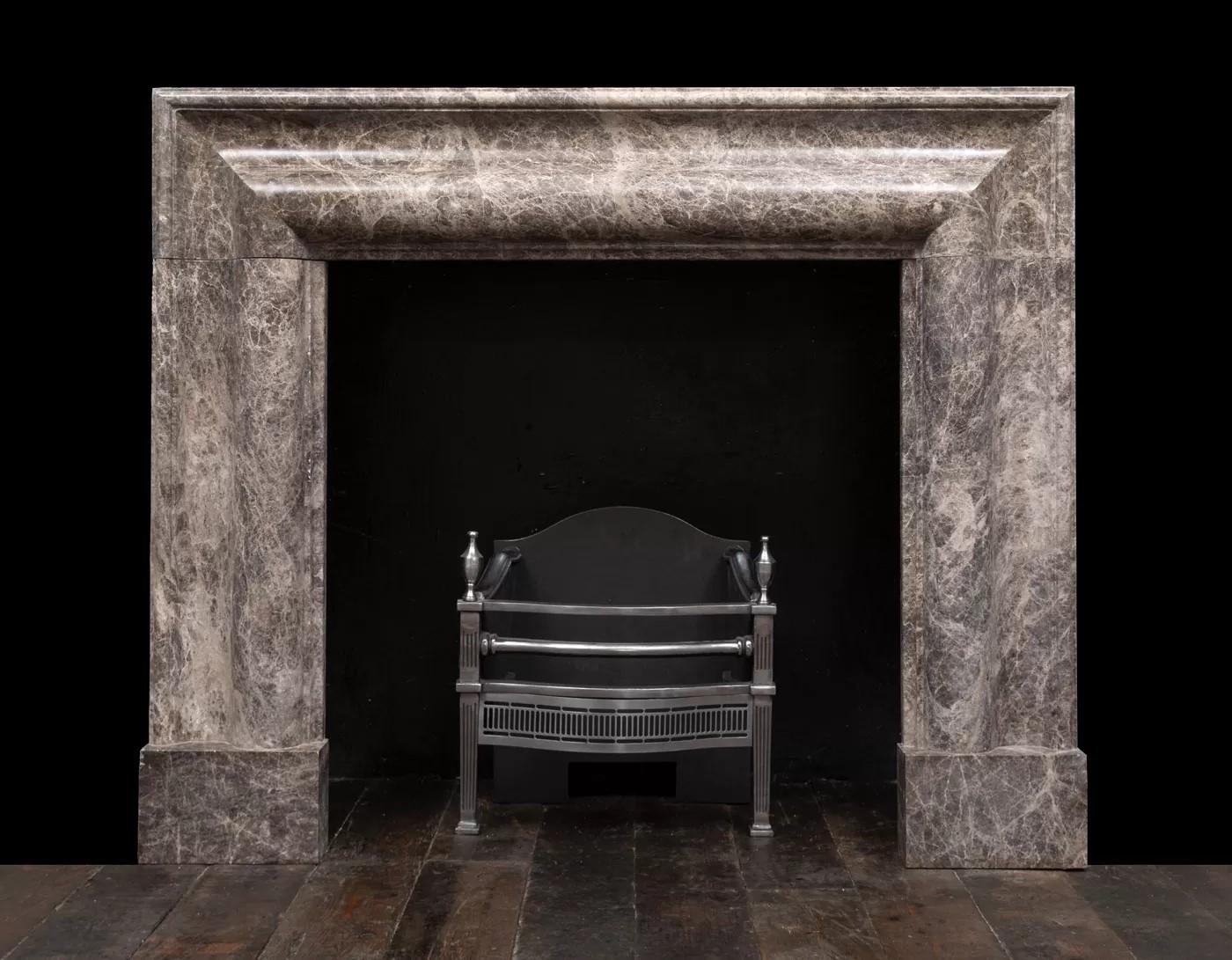 Modern large bolection mantel of Emperador marble produced by Ryan & Smith For Sale