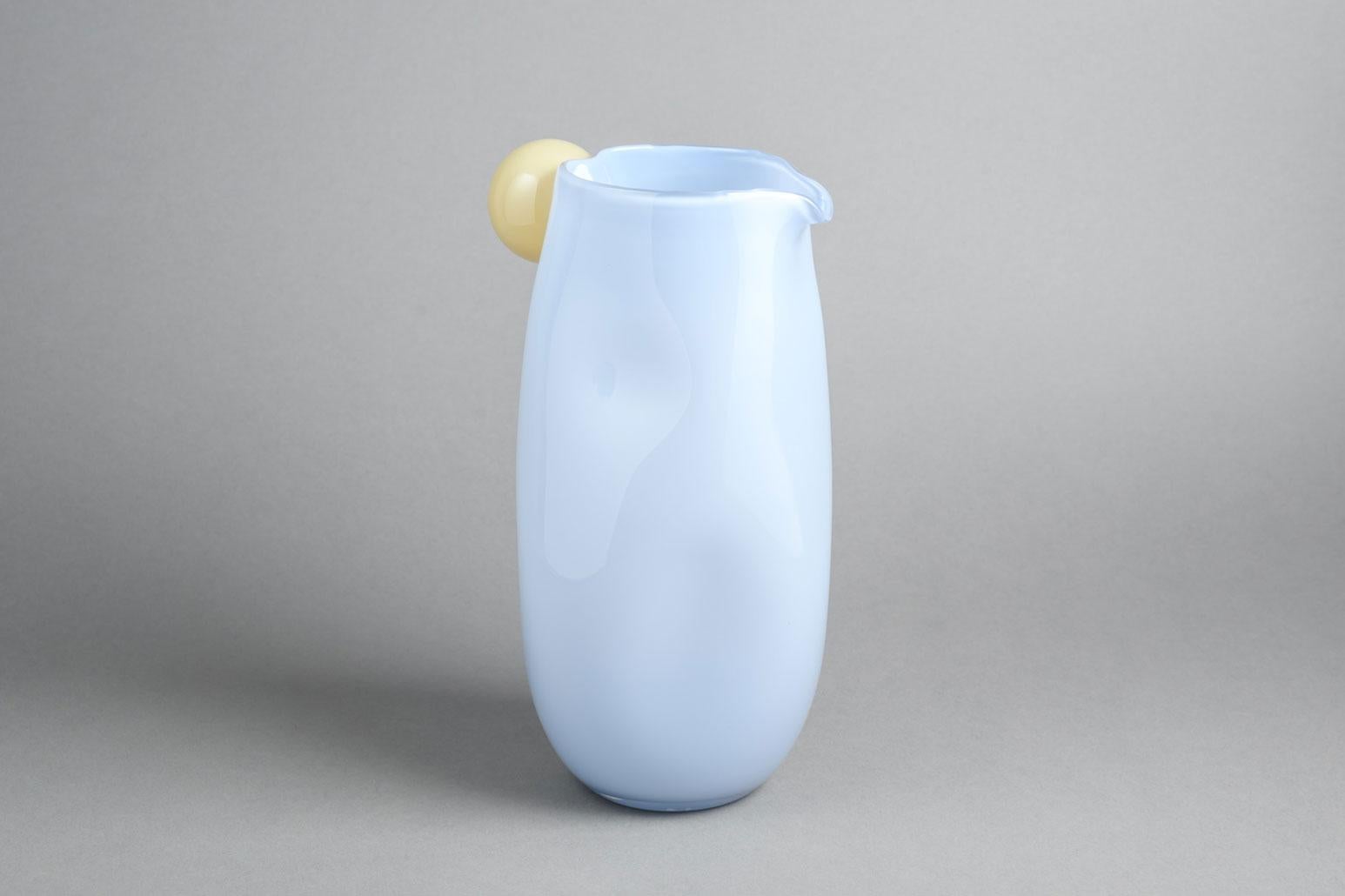 Large Bon Bon Jug with a Twist by Helle Mardahl
Dimensions: D 13 x H 27 cm
Materials: glass
Available in other size,

The Jug Massive with a twist is part of the organically shaped collection of tableware by Helle Mardahl. With the delicious