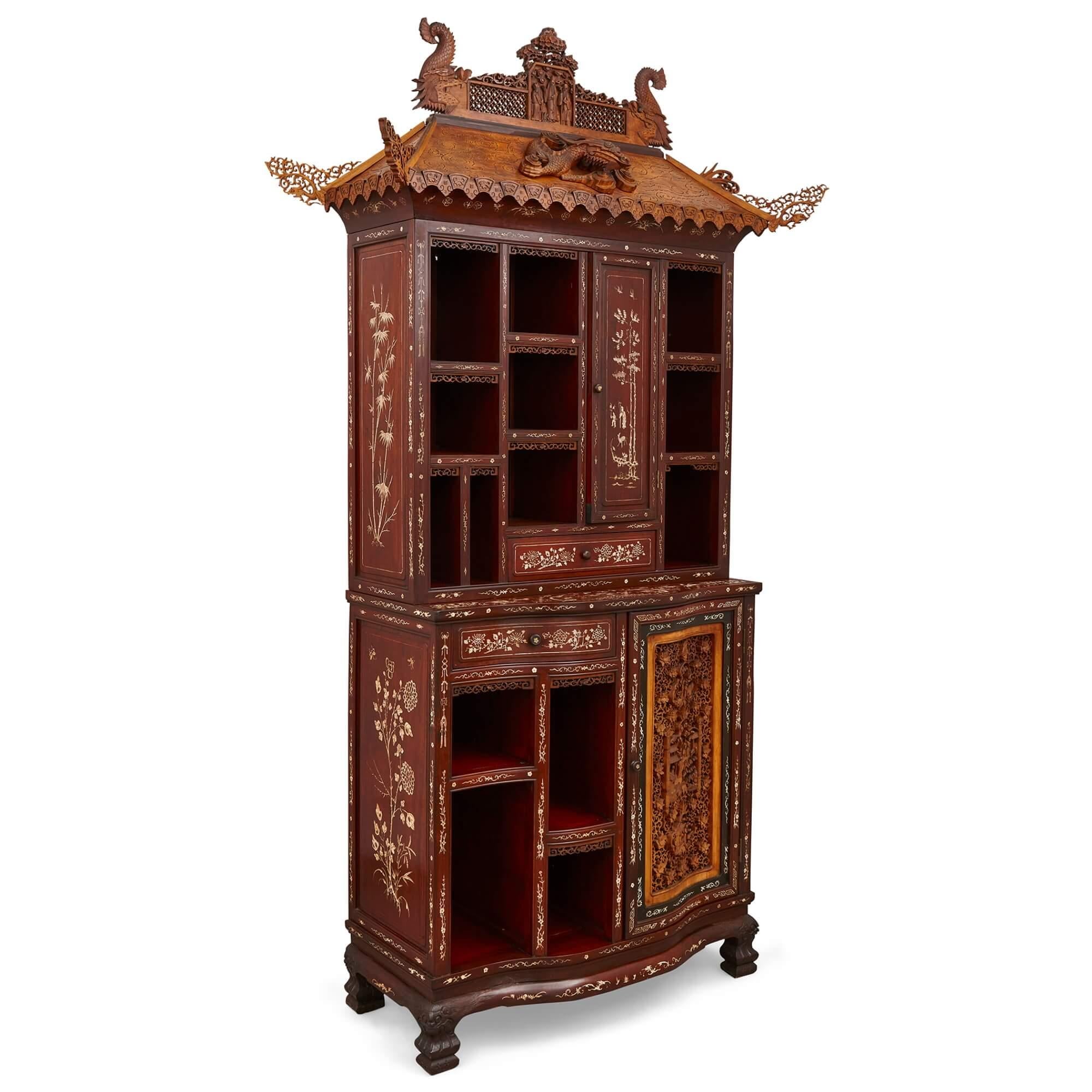 Large Bone-Inlaid Hardwood, Boxwood, and Ebony Chinese Cabinet
Chinese, Early 20th Century
Height 230cm, width 128cm, depth 55cm

Featuring a pierced and carved door panel to the front, which depicts various interior scenes, and set among rich,