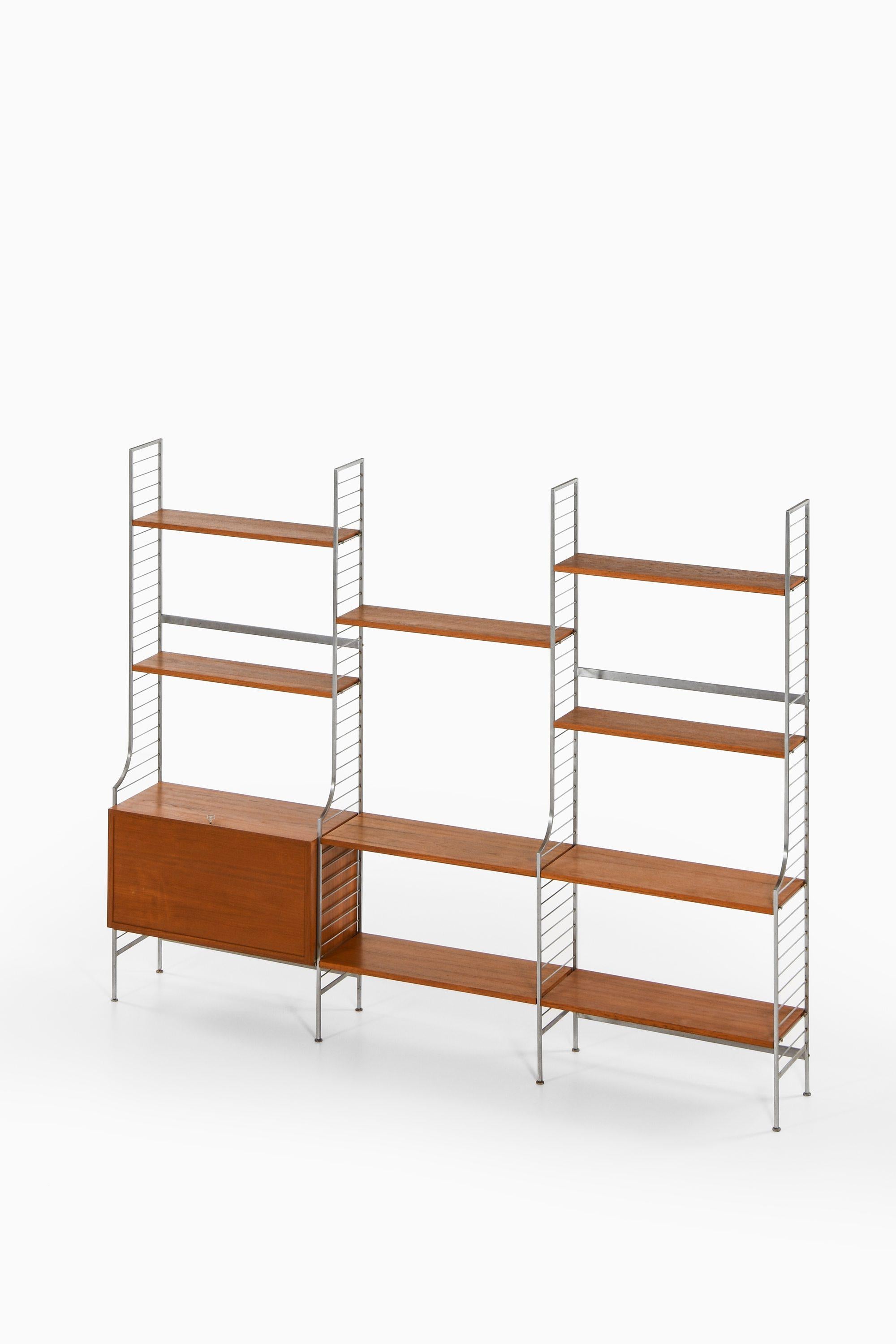 Großes Bücherregal aus Teakholz und verchromtem Stahl von Nils Strinning, 1960er Jahre (Skandinavische Moderne) im Angebot