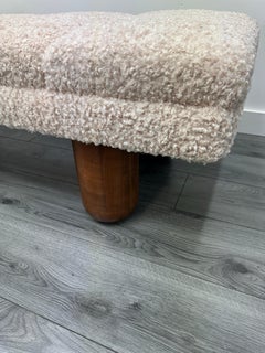 Large bouclé bench with solid oak legs