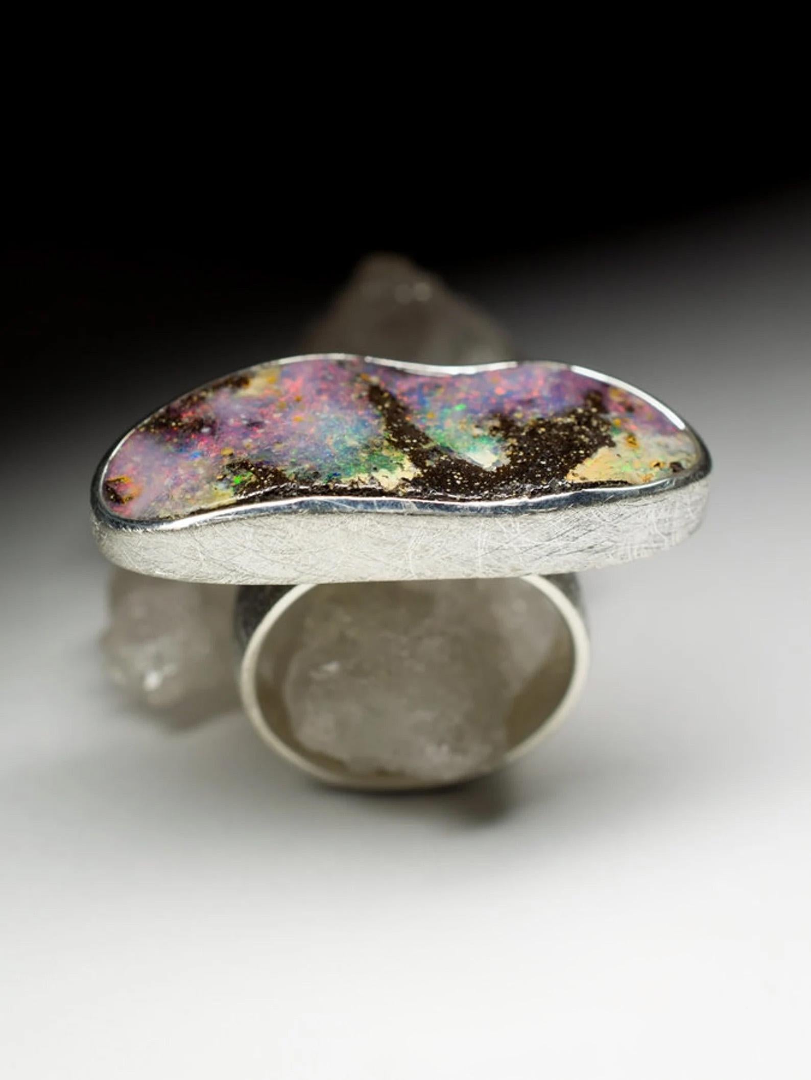 Matte finish silver ring with natural Boulder Opal
opal origin - Australia
weight of the opal - 18.2 carat
weight of the ring - 10.53 grams
ring size - 7 1/4 US / 55 EU
opal measures - 0.24 х 0.47 x 1.26 in / 6 x 12 x 32 mm