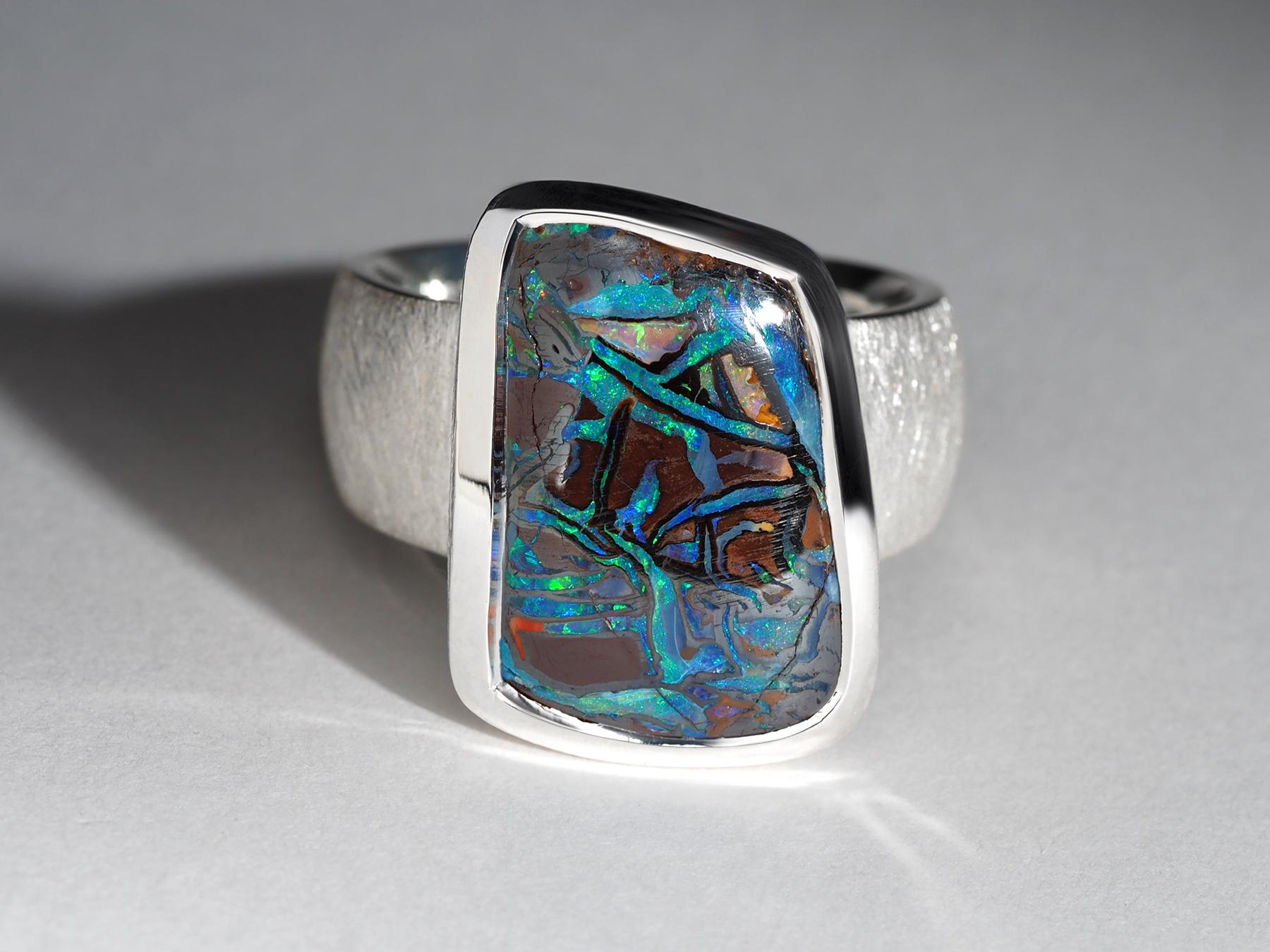 One of a kind statement silver ring with natural Koroit Boulder Opal of 13.5 carats
Opal origin - Australia
Opal measurements - 12 x 16 mm / 0.47 x 0.62 in
US Size 8.5 = UK Size K 1/2 = European Size 57 = Diameter 18.5 mm = Circumference 57