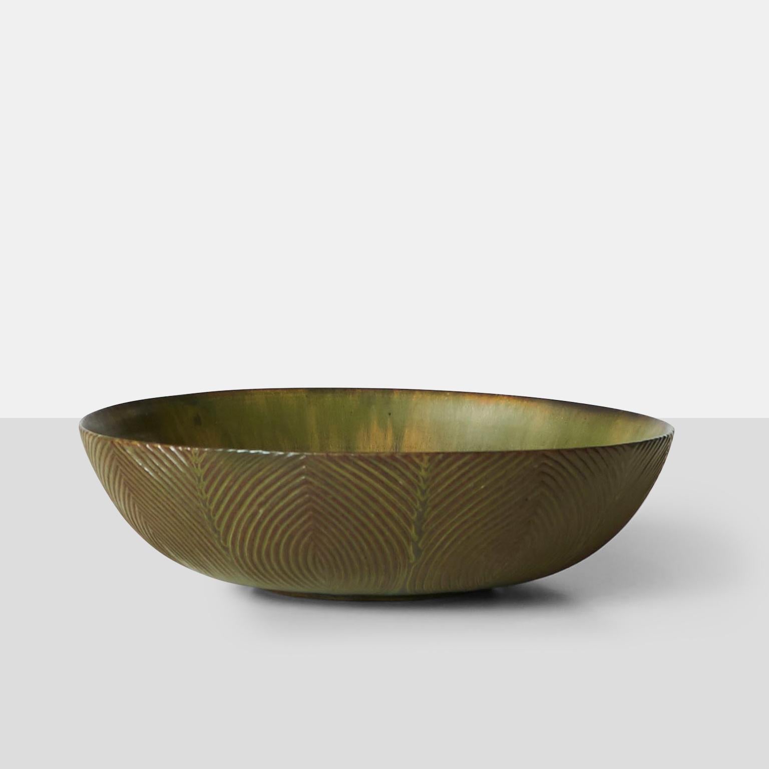 A unique stoneware bowl in Sung earthenware toned glaze by Axel Salto for Royal Copenhagen. Each piece is hand-crated and signed by the maker.
Signed on the base. Salto 1933.