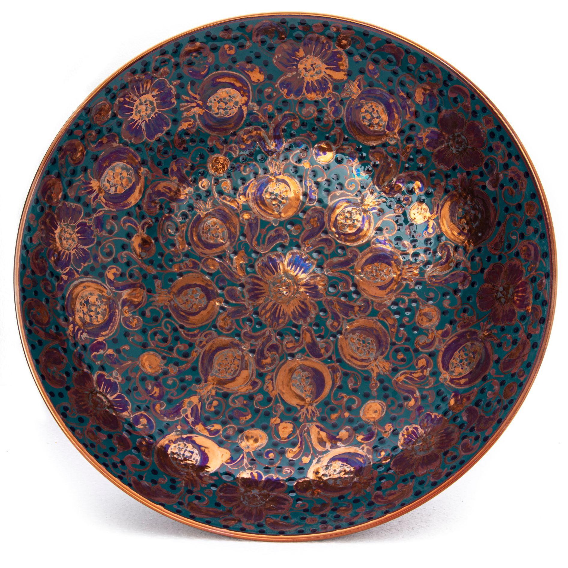 Large bowl with pomegranate decor, full-fire reduction faience earthenware 40 cm diameter, unique piece, 2020

Bottega Vignoli is a brand of artistic ceramics based in Faenza, one of the most representative ceramic production centres in Italy.