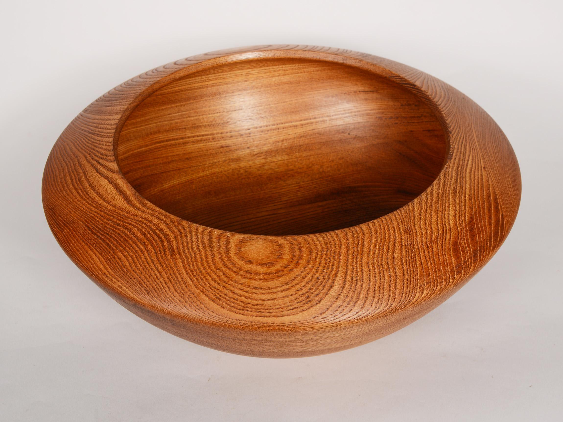 Large salad or decorative bowl made by Tokaido of Japan. This bowl takes great advantage of the prominent grain of keyaki wood.
