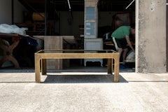 Grande table basse miroir en laiton et bronze par Peter Guzhy