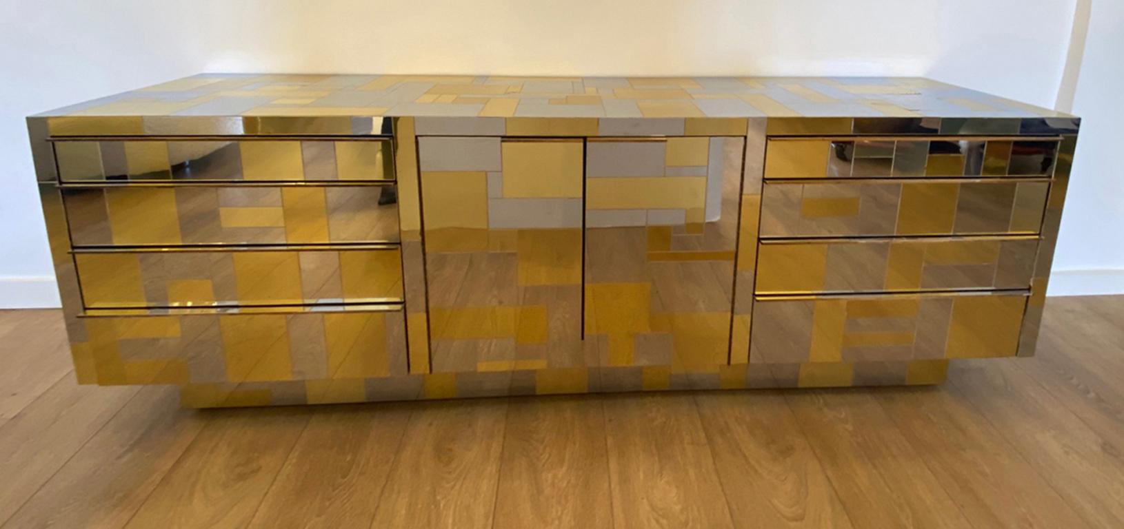 Large brass and chrome sideboard by Paul Evans from the Cityscape Collection for Directional, circa 1970's
All chrome and brass tiles mosaic patchwork, 
Rare design combines on:
Either side flanking four set of drawers, 
Pair of double door in