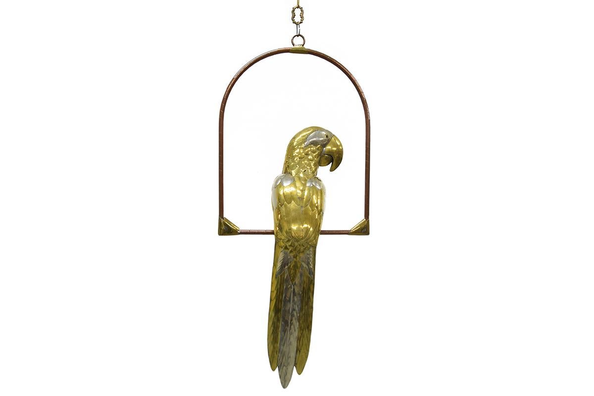 One of a kind brass and copper handmade limited edition Parrot on a swing made in the 1960s by Mexican artist Sergio Bustamante. Very decorative piece.