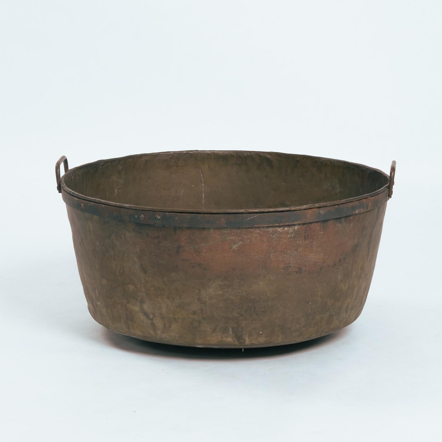 A large copper (72 cm 28.35 inches diameter) container with a welded seam, and handles. Retaining original well-utilized and workshop-aged surface. Great large size for logs next to a fireplace hearth.
height: 36 cm
weight: 10 kg