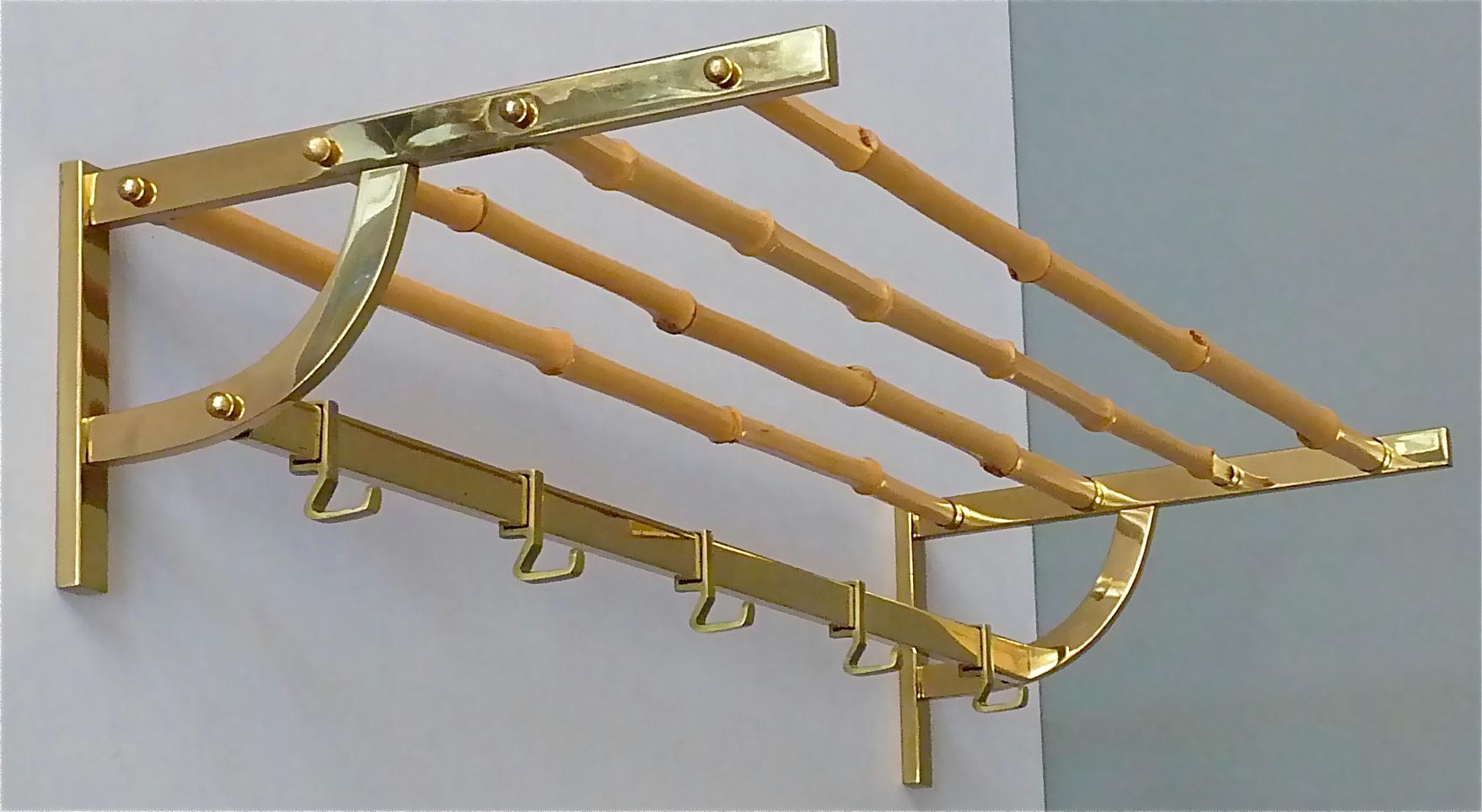 Stunning and exceptional modernist coat rack or wall wardrobe, which has been designed and executed in the 1950s in Austria, probably it belongs to one of the wonderful designs by Hagenauer, Josef Frank for Haus & Garten or Kalmar. It is made of