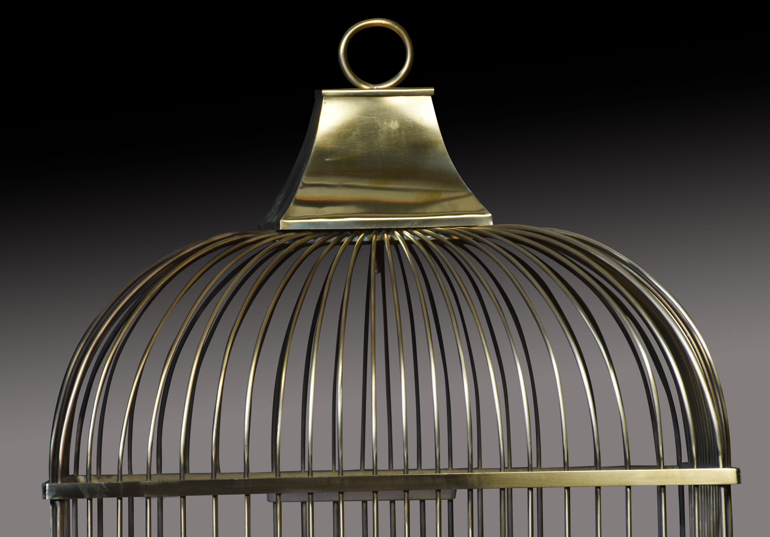 19th-century birdcage of rectangular form, having brass wirework top with original feeders and solid brass base.
Dimensions
Height 27.5 Inches
Width 19 Inches
Depth 14 Inches