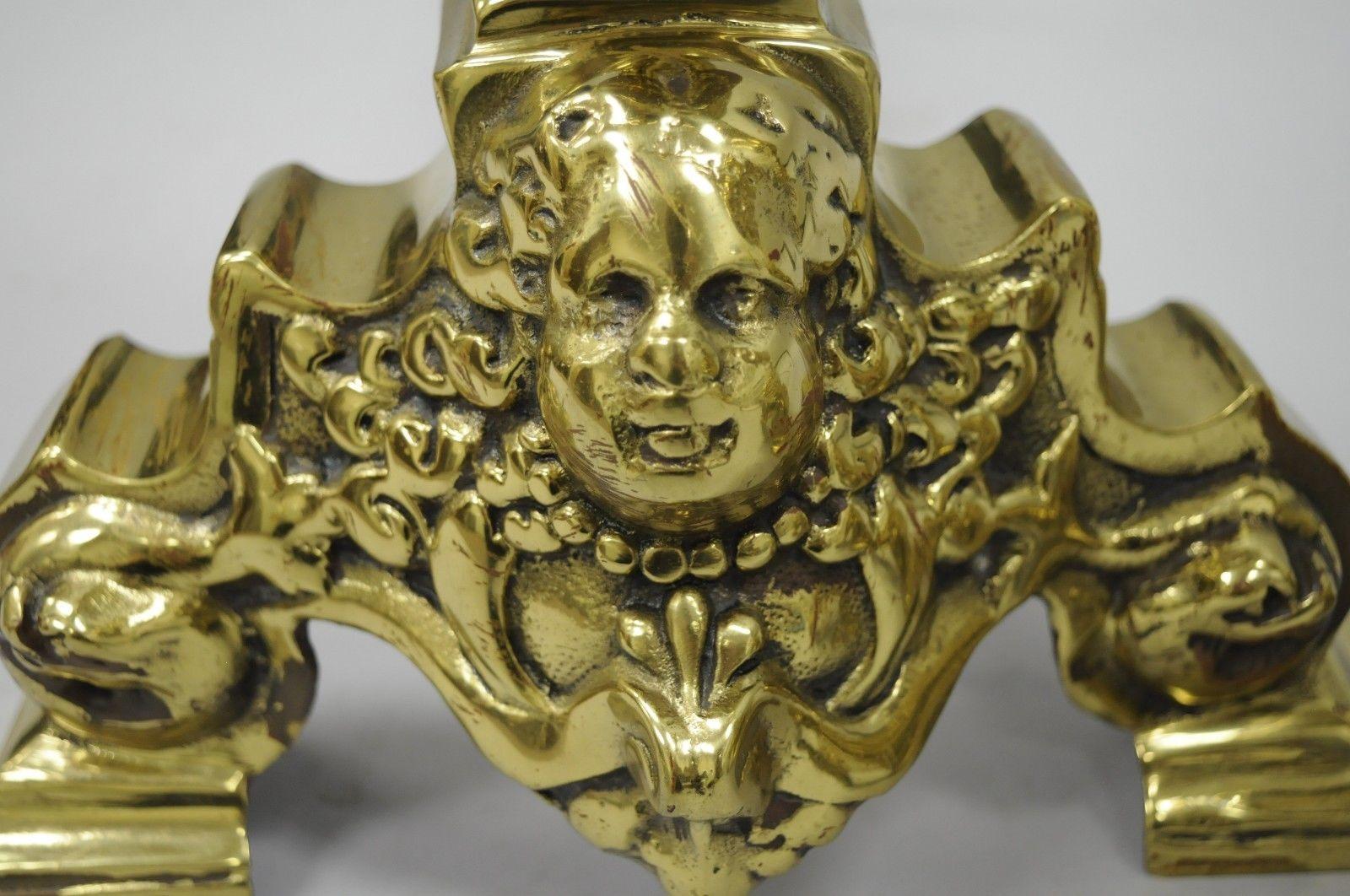 20th Century Large Brass Cannonball Andirons French Empire Style Putty Cherub Angel Baby Face For Sale